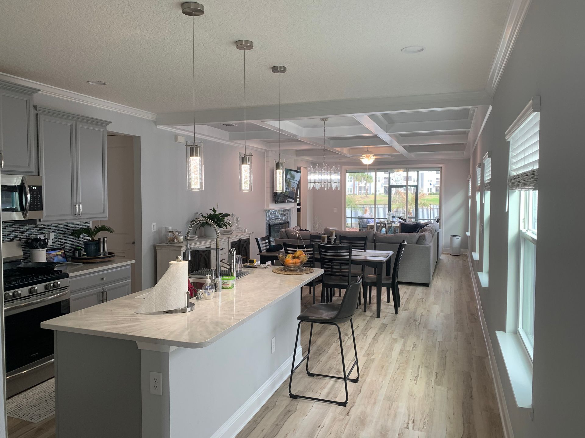 A kitchen with a large island in the middle of the room.