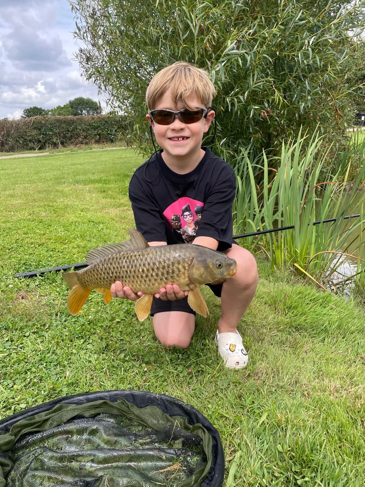 Children fishing - Great catch!