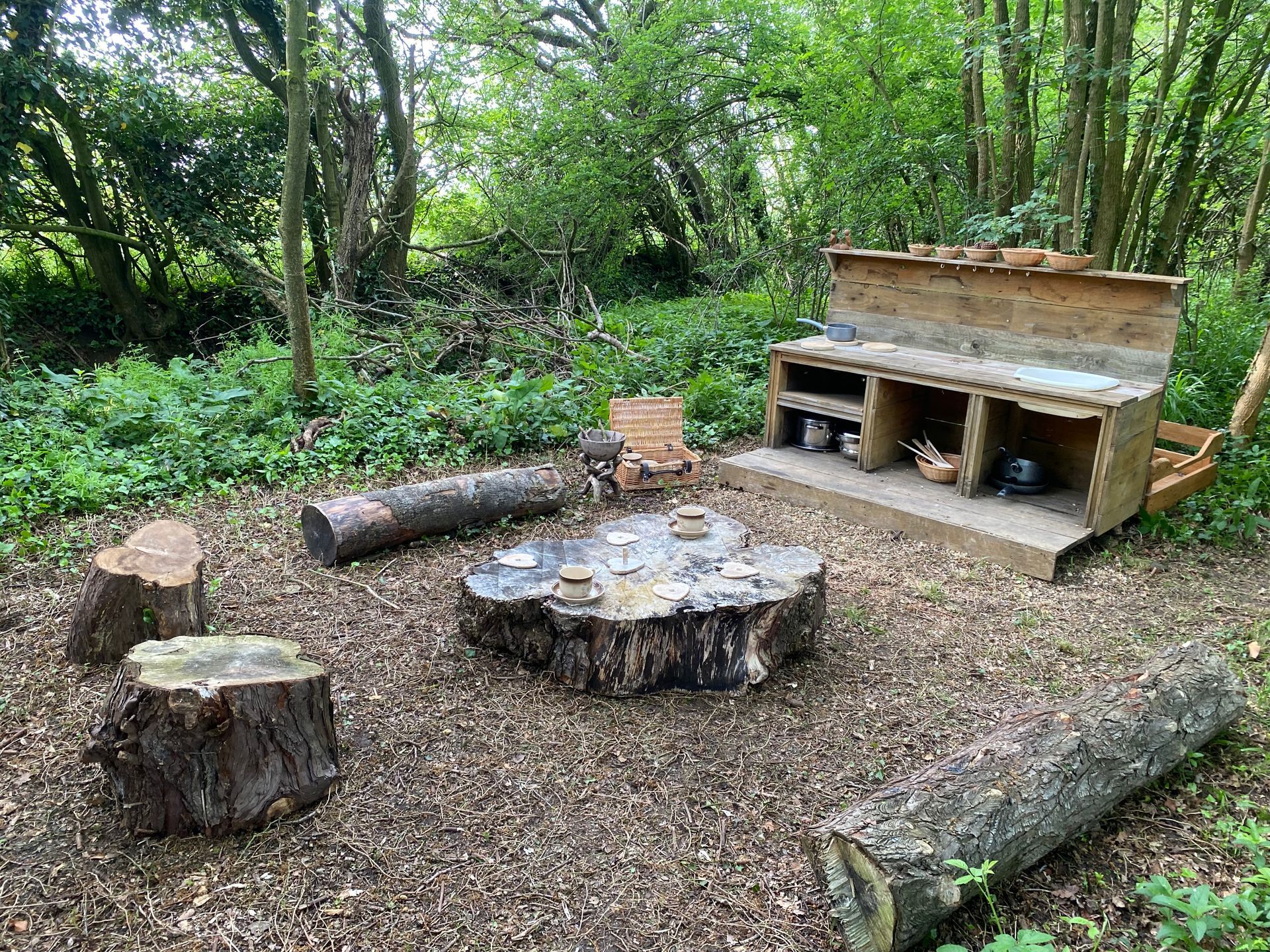 Mud kitchen in the wooded area