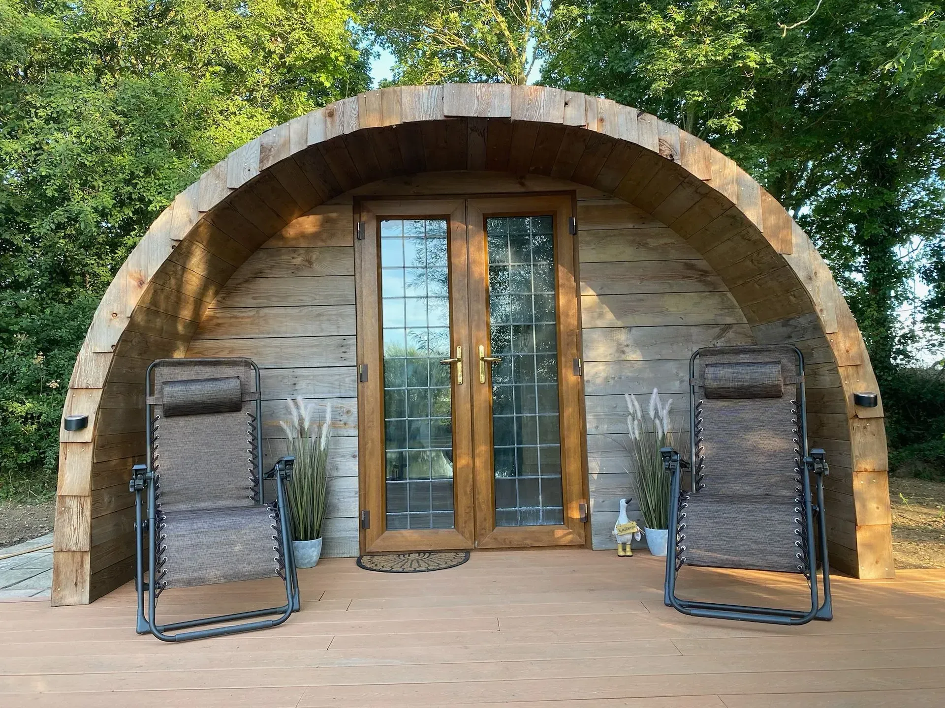 Relax on the loungers on the Nest deck area