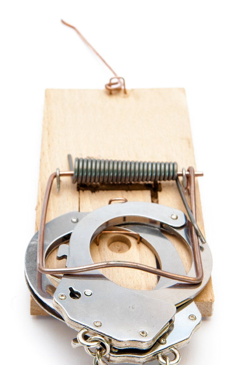 Criminal Law — Handcuffs And Mousetrap in Carrollton, GA