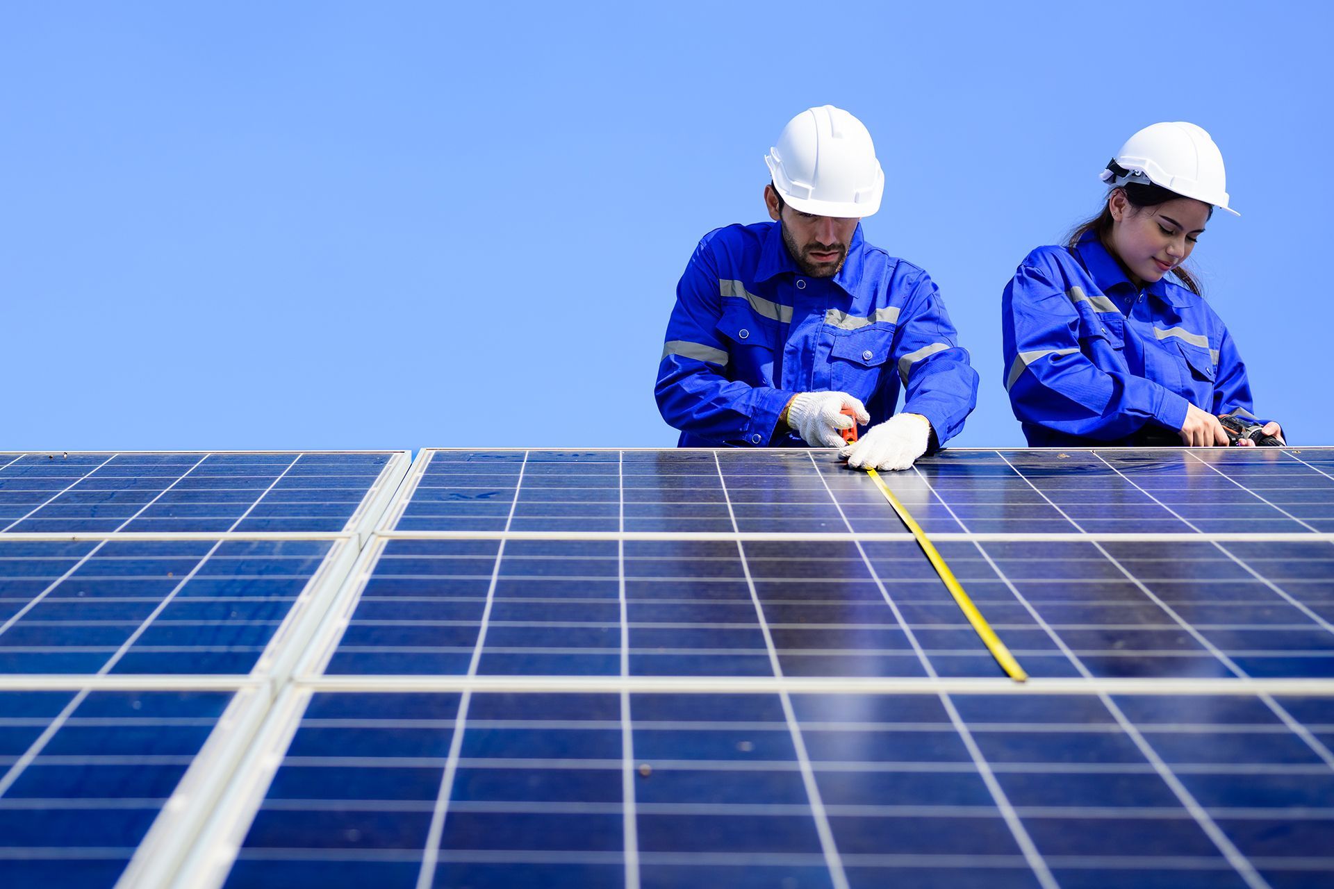 NRGTree Team Installing Solar Panels