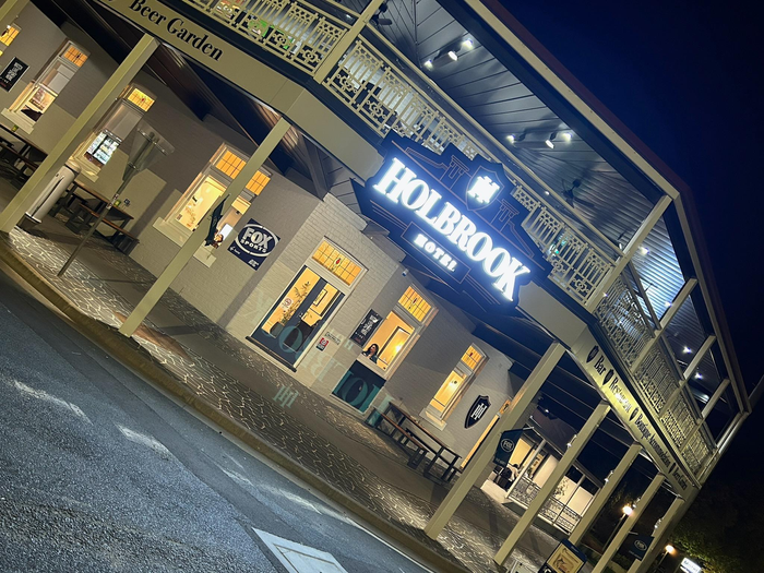 Holbrook Hotel Sign Lit Up At Night Time — We Design & Manufacture Signage in the Albury-Wodonga, NSW