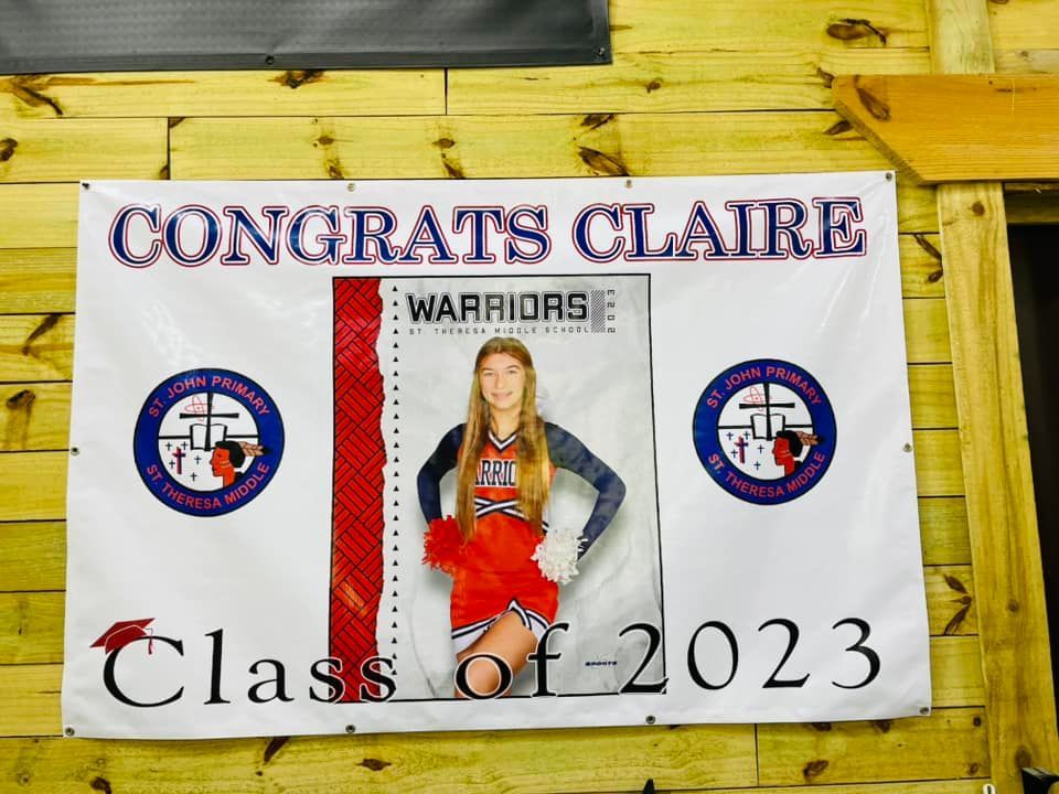 Banner congratulating Claire, a cheerleader, from the 