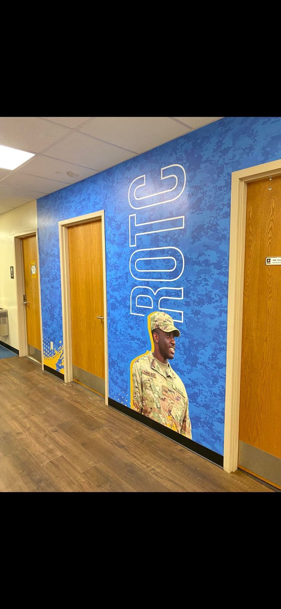 A hallway with blue wall with 