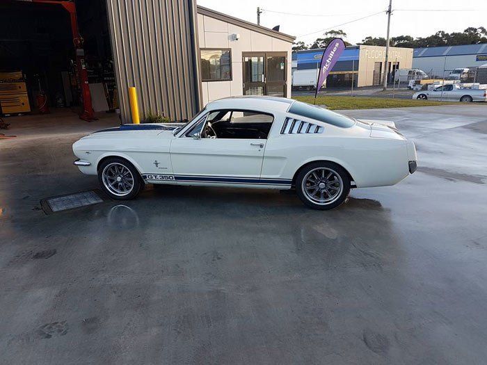 View of white car after repair