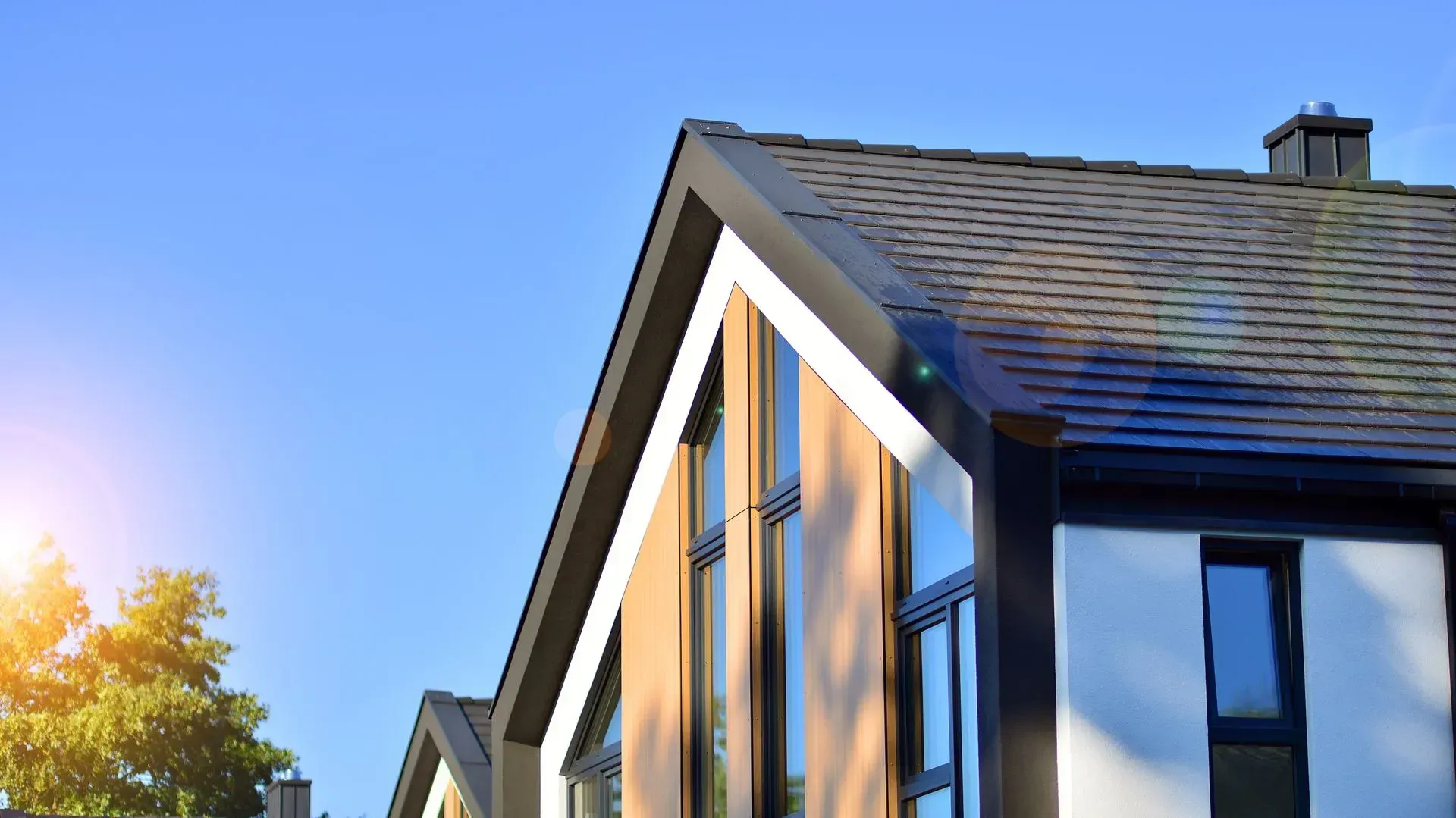 The sun is shining through the windows of a house