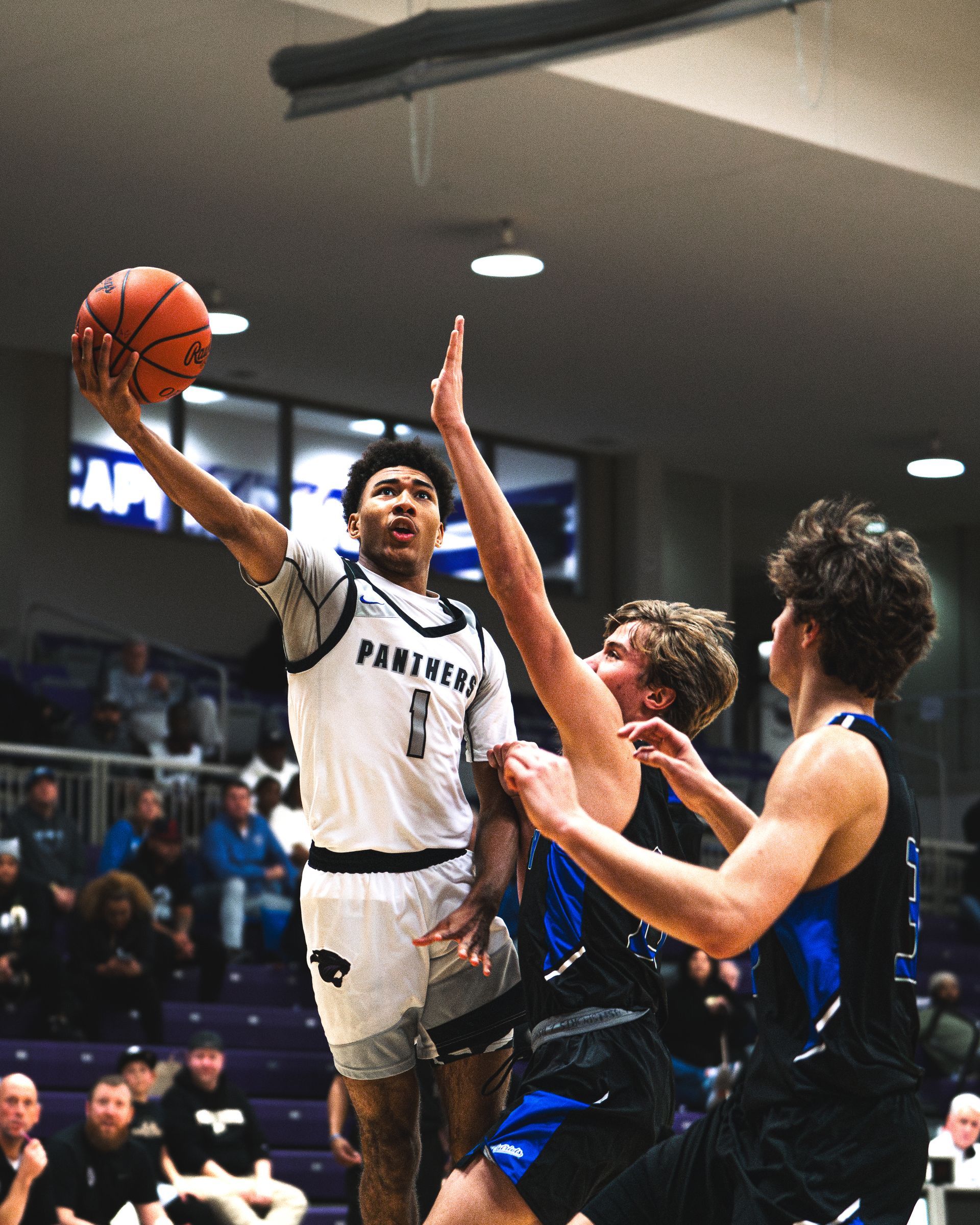 A basketball player with the number 9 on his jersey