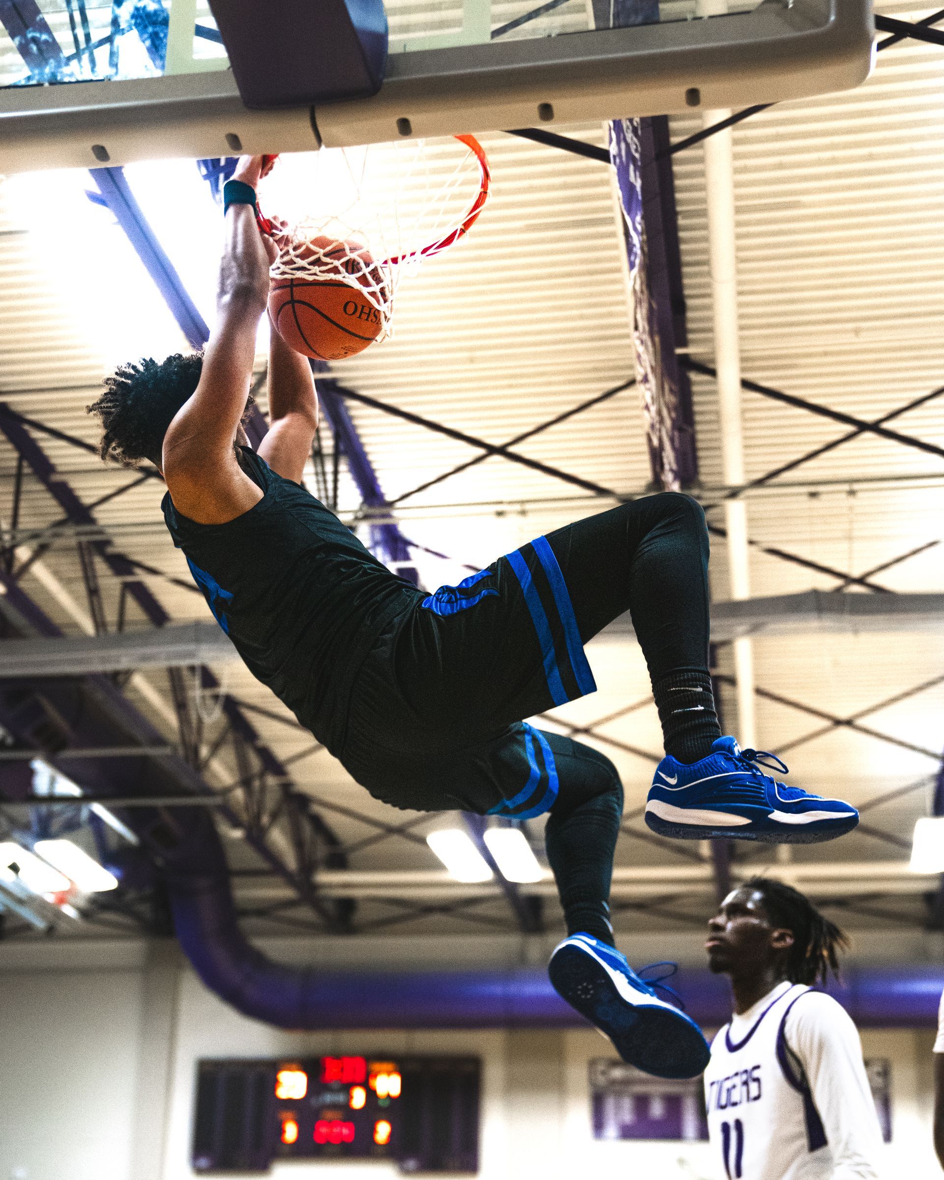 A basketball player with the number 11 on his jersey