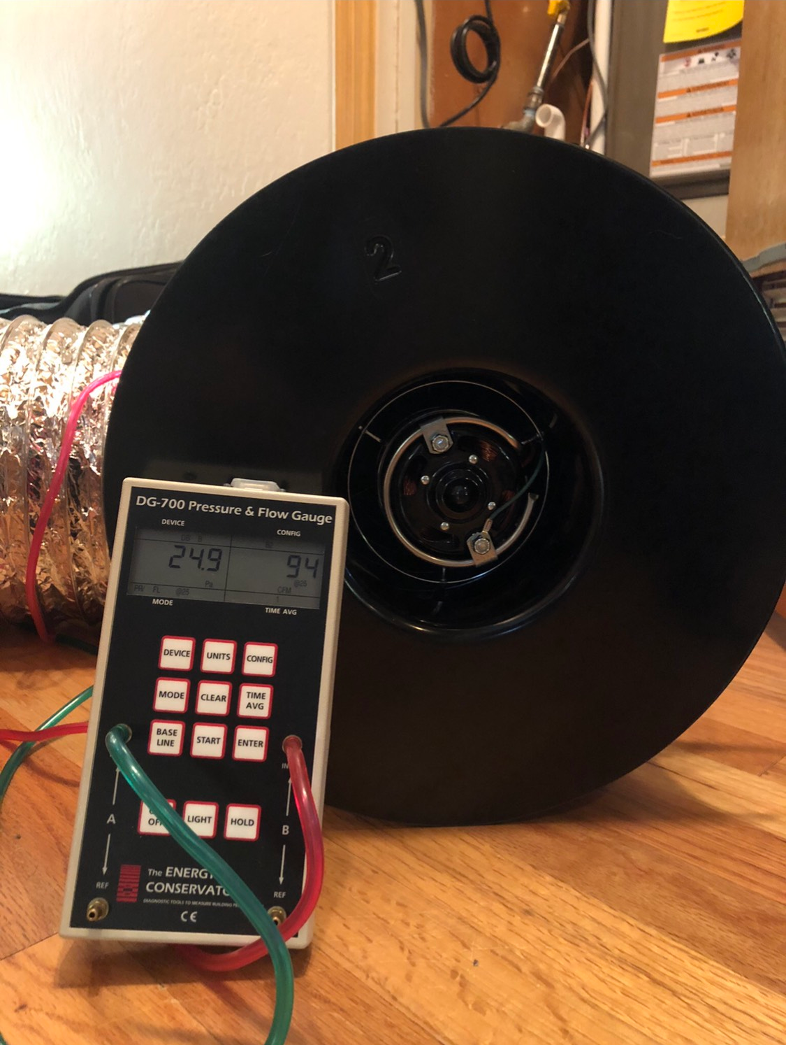 A thermometer on a wooden table
