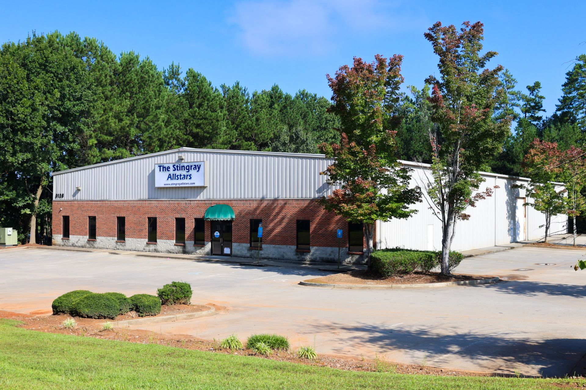 A large building with a sign that says ' the company ' on it