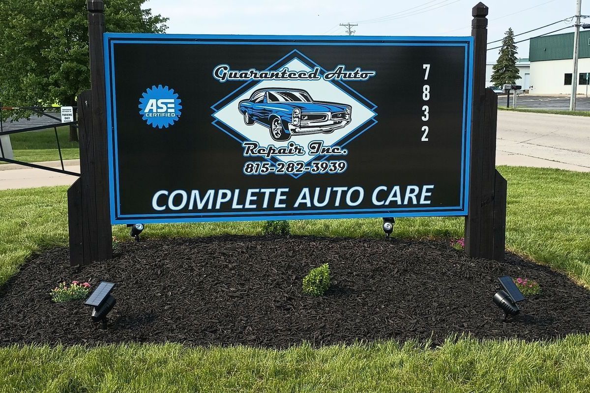 Signboard | Guaranteed Auto Repair