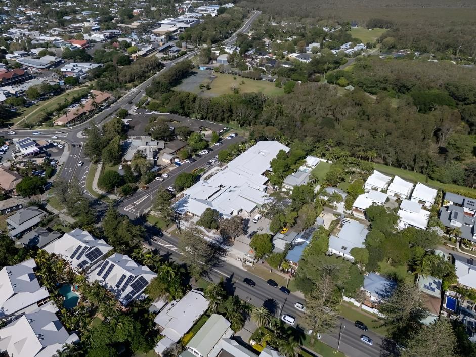 Town With Buildings, Trees, and a Large White-roofed Structure — Northern Rivers Metal Roofing PTY LTD In Byron Bay, NSW