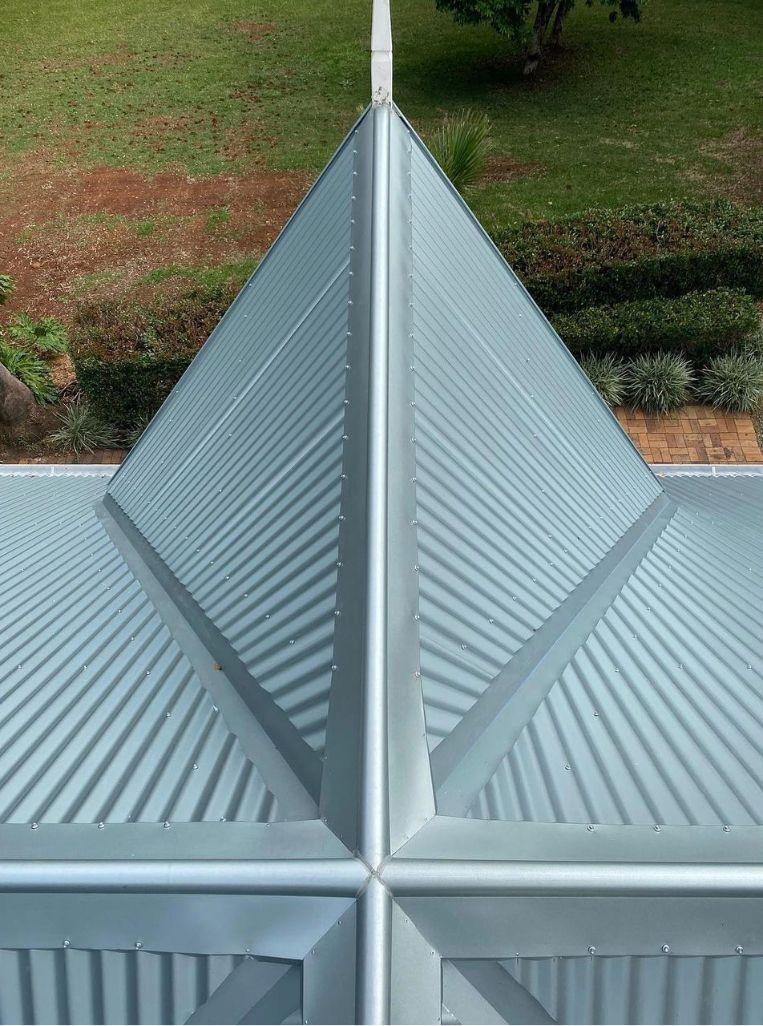 A Close Up of a Metal Roof With a Pyramid Shaped Roof — Northern Rivers Metal Roofing PTY LTD In Alstonville, NSW
