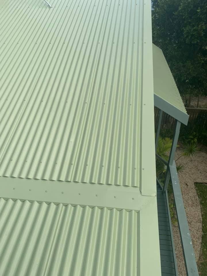 Rooftop View of a Green Corrugated Metal Roof