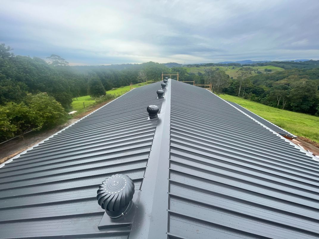 The Roof of a Building With a View of a Field  — Northern Rivers Metal Roofing PTY LTD In Ballina, NSW