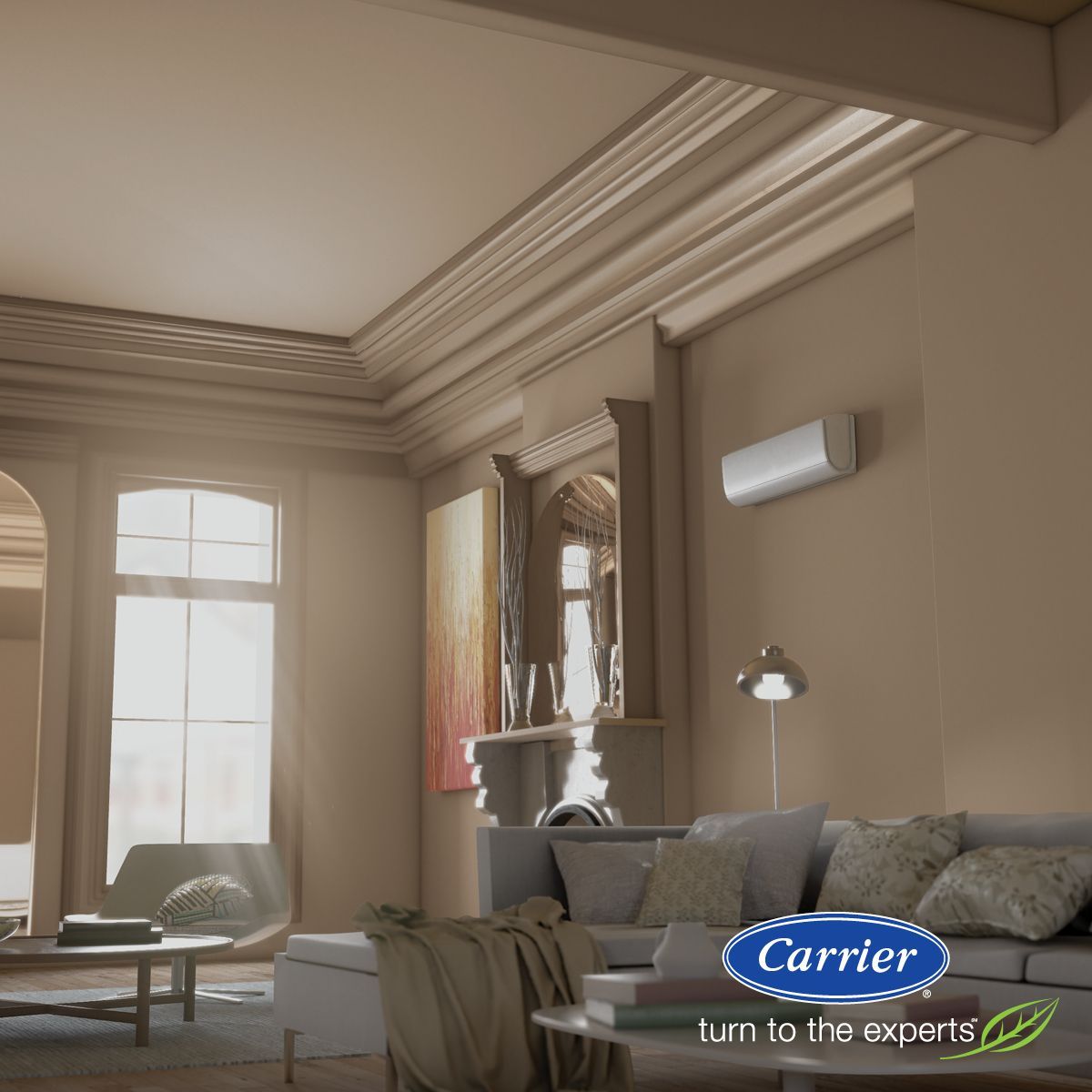 Living room with Carrier air conditioner, beige walls, couch, table, artwork, and sunlight.