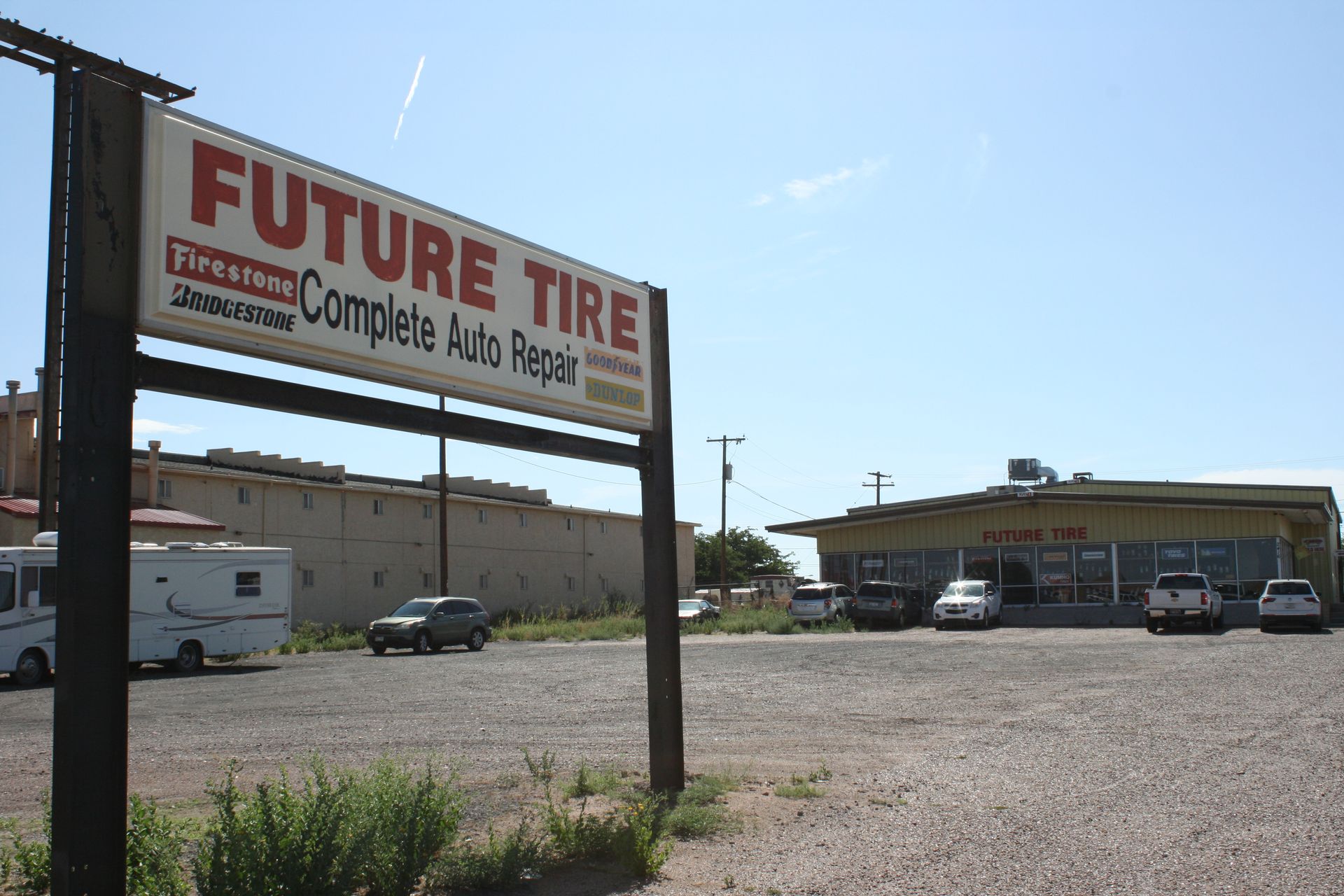 A sign for future tire complete auto repair