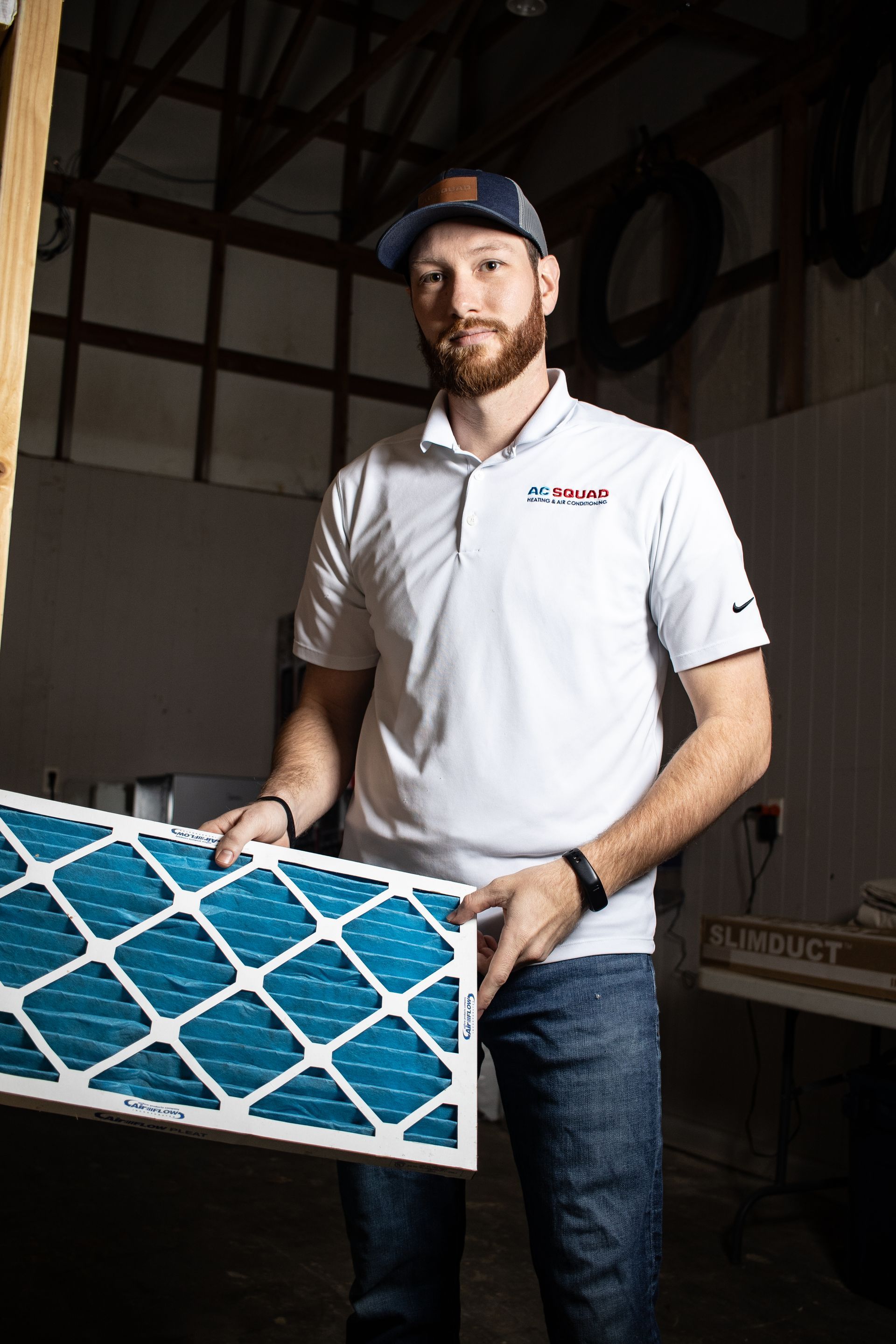 Two purple light bulbs are glowing in the dark.