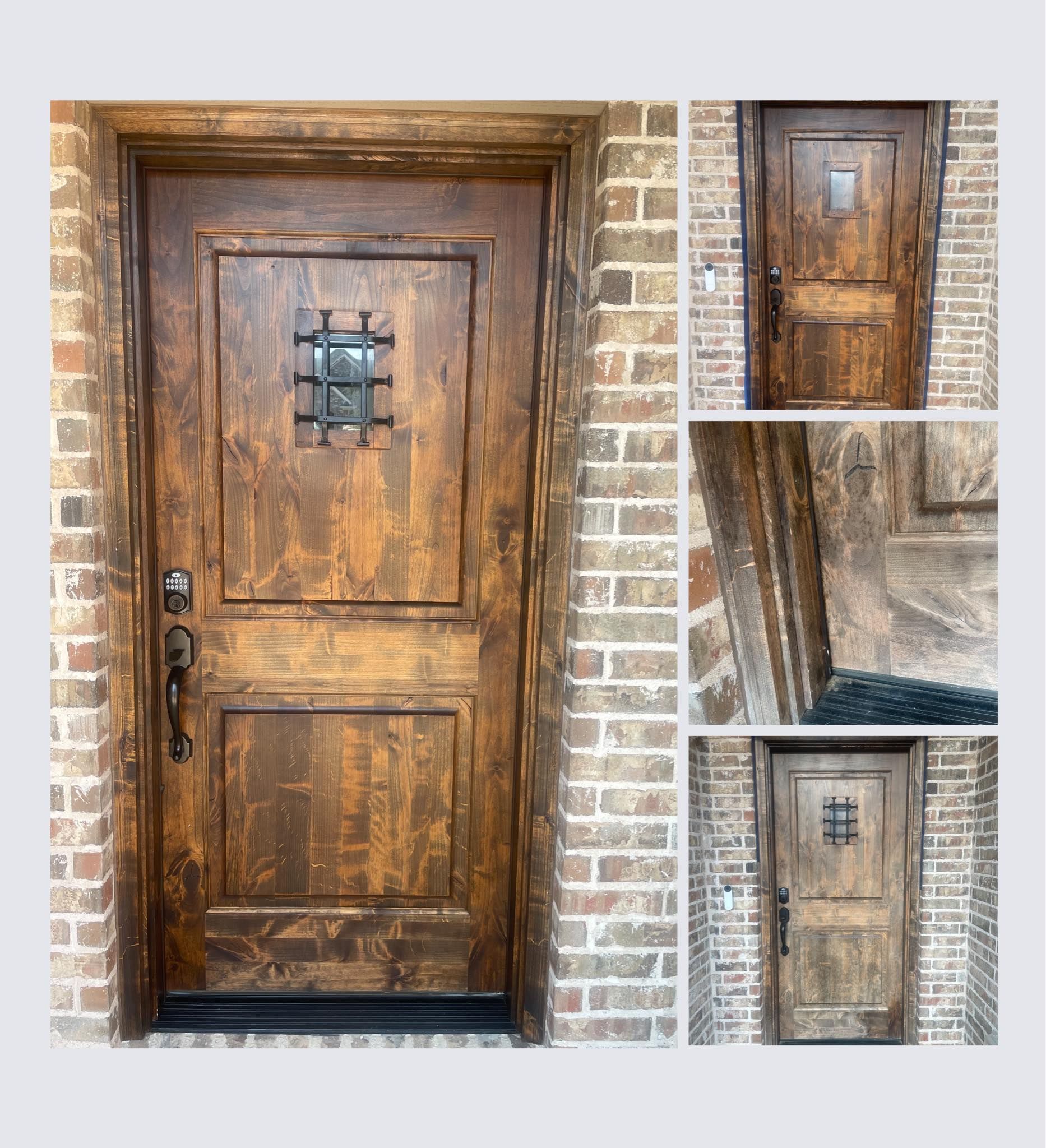 Wooden front door with wrought iron accents, set in a brick wall.
