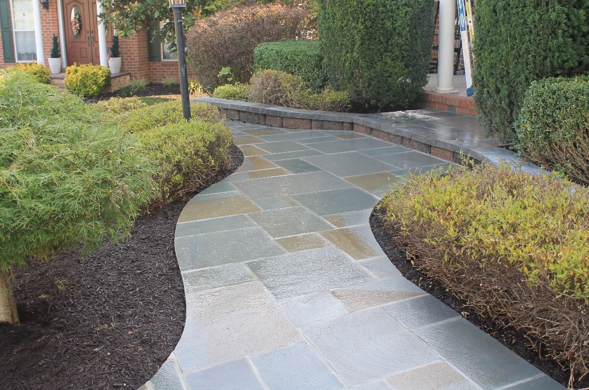 There Is A Walkway Leading To The Front Of A House - Perry Hall, MD - Oakwood Landscaping LLC