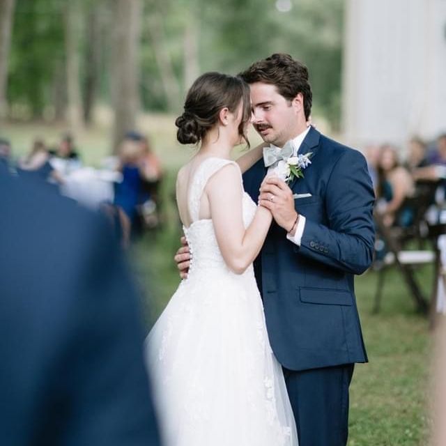 Picture of one of Kate Scullen's clients and her husband at their wedding