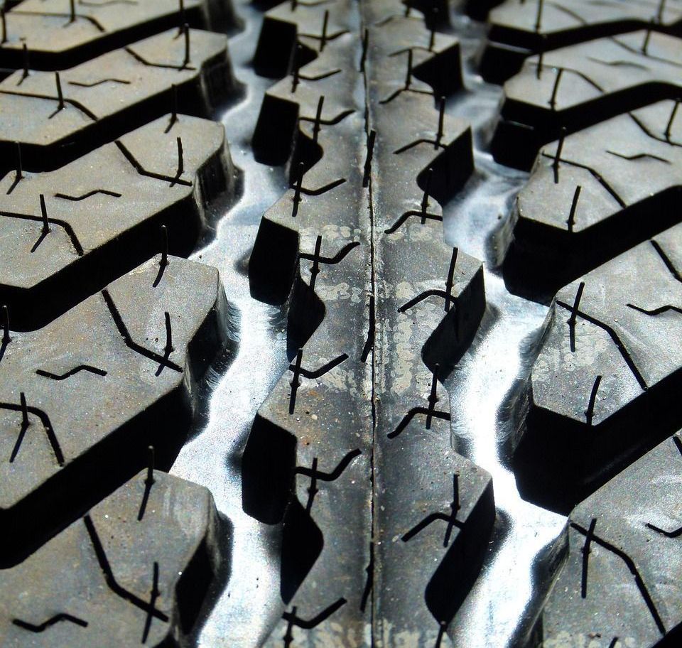 A close up of a tire with a pattern of x 's on it