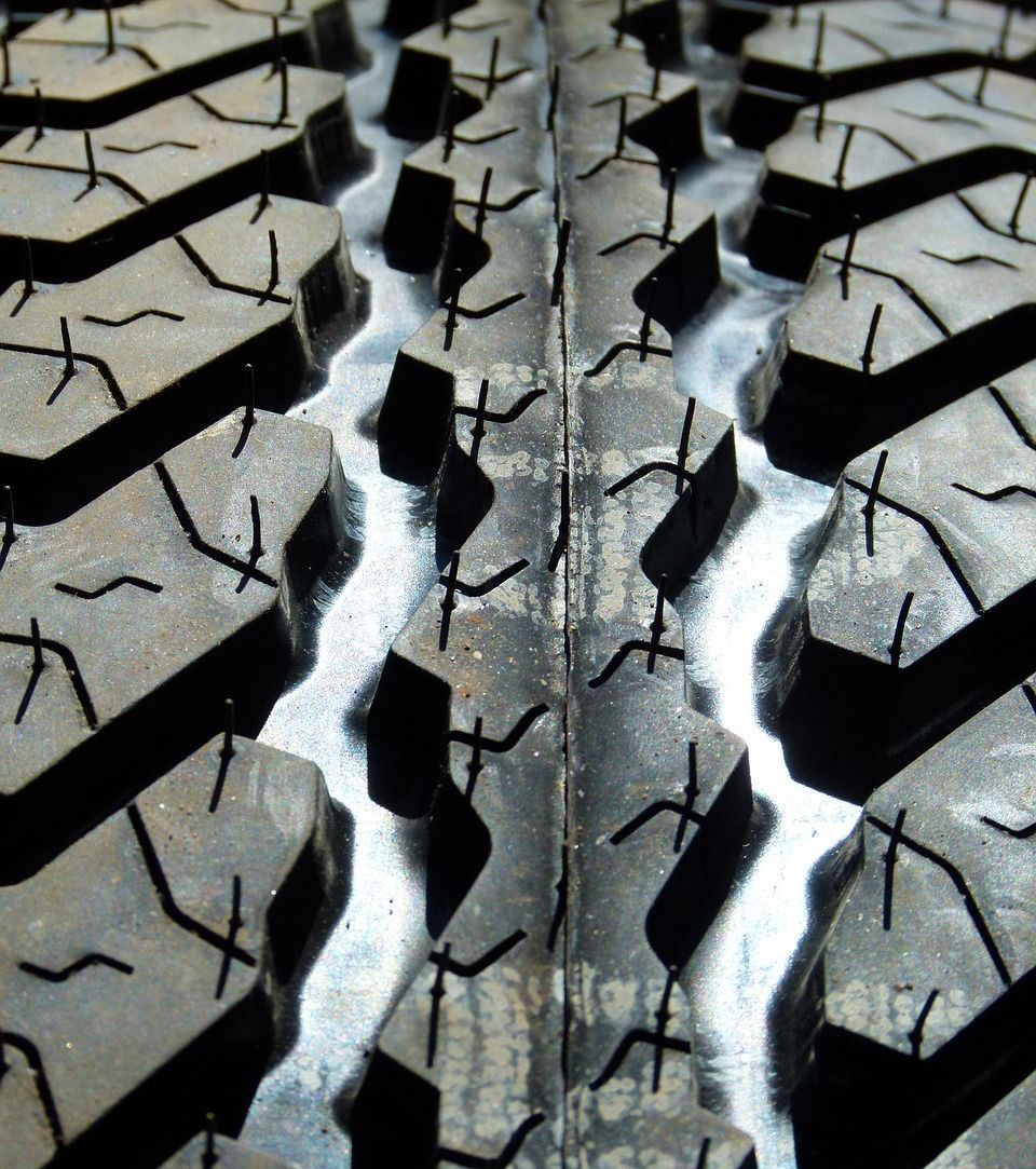 A close up of a tire with a pattern of x 's on it