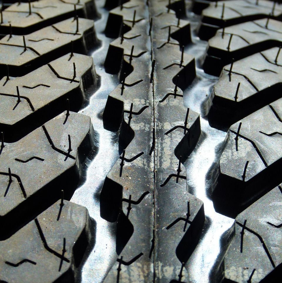 A close up of a tire with a pattern of x 's on it