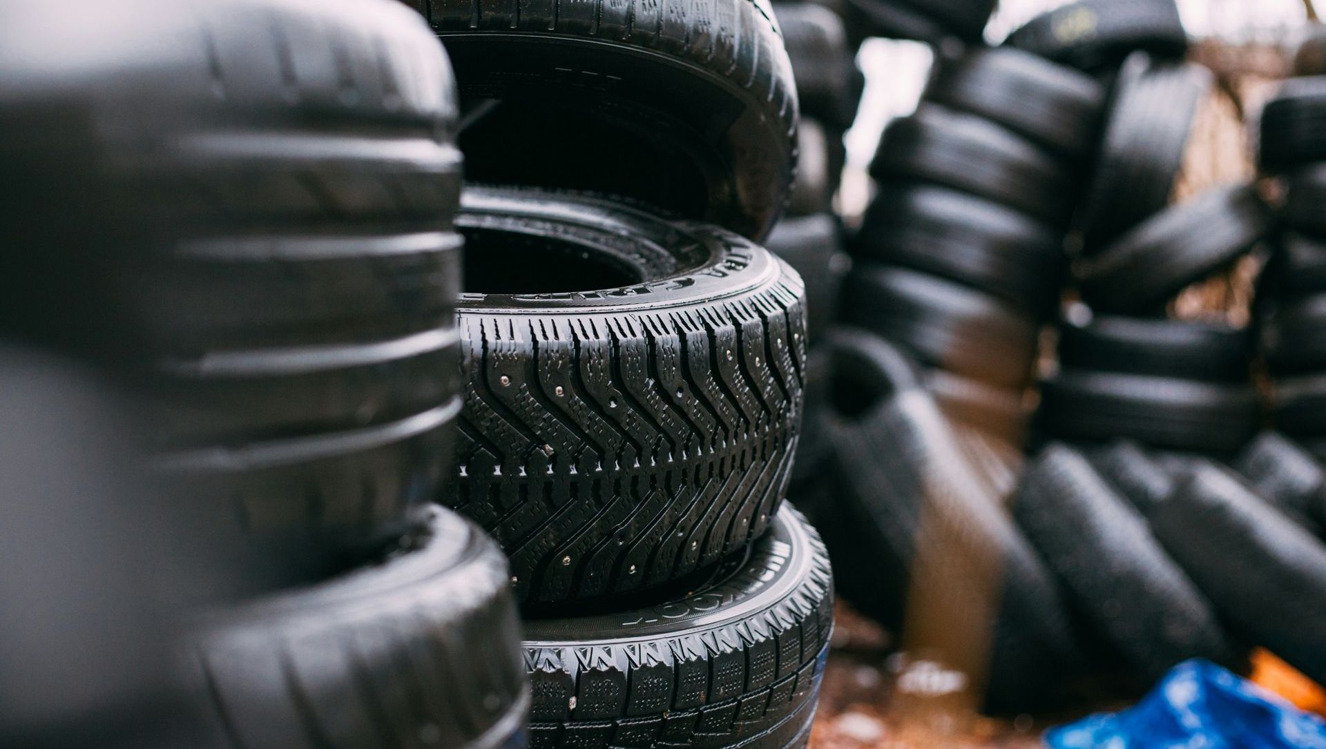 A pile of tires stacked on top of each other.
