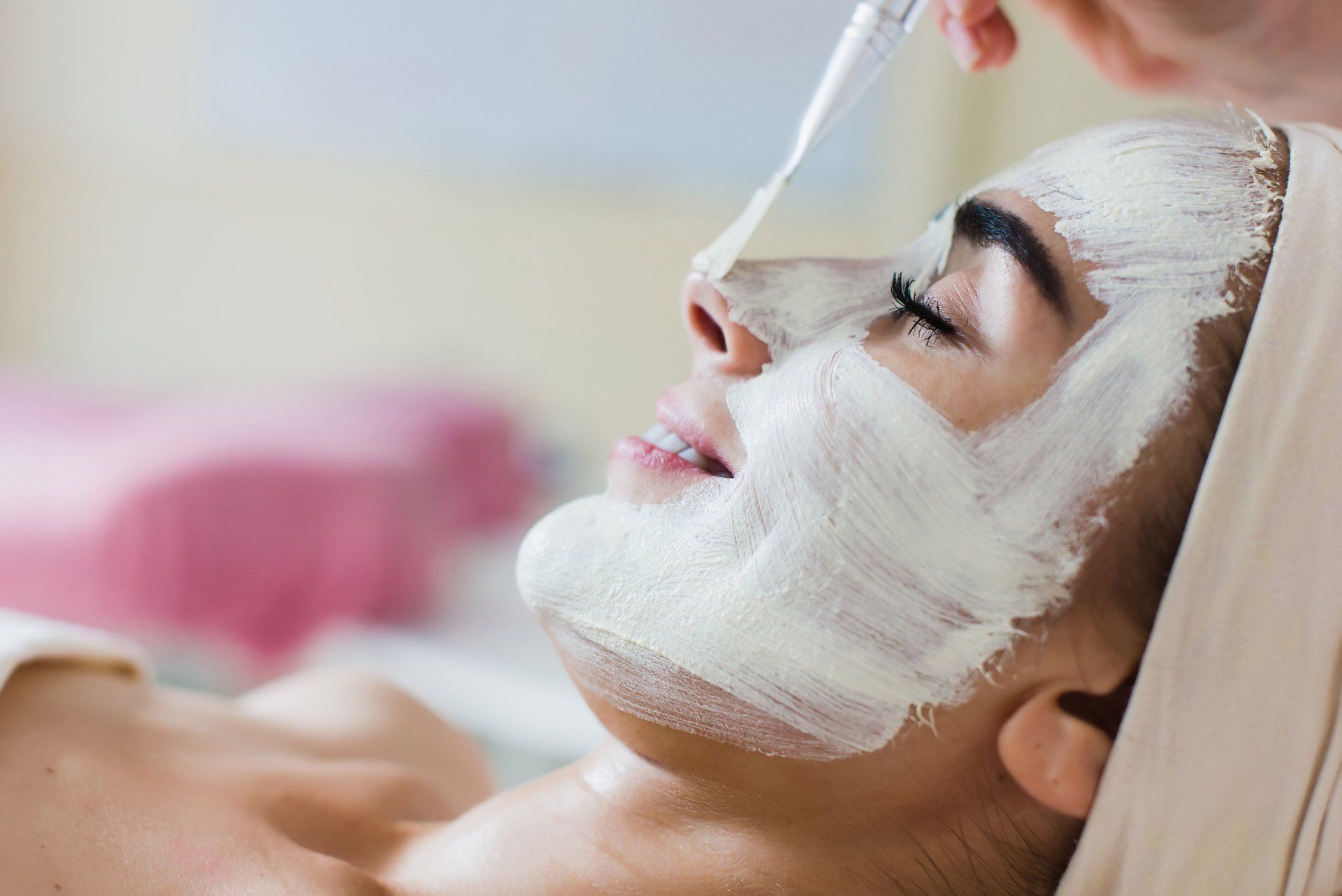 Woman receiving chemical peel treatment from Hot Springs Surgery and Vein