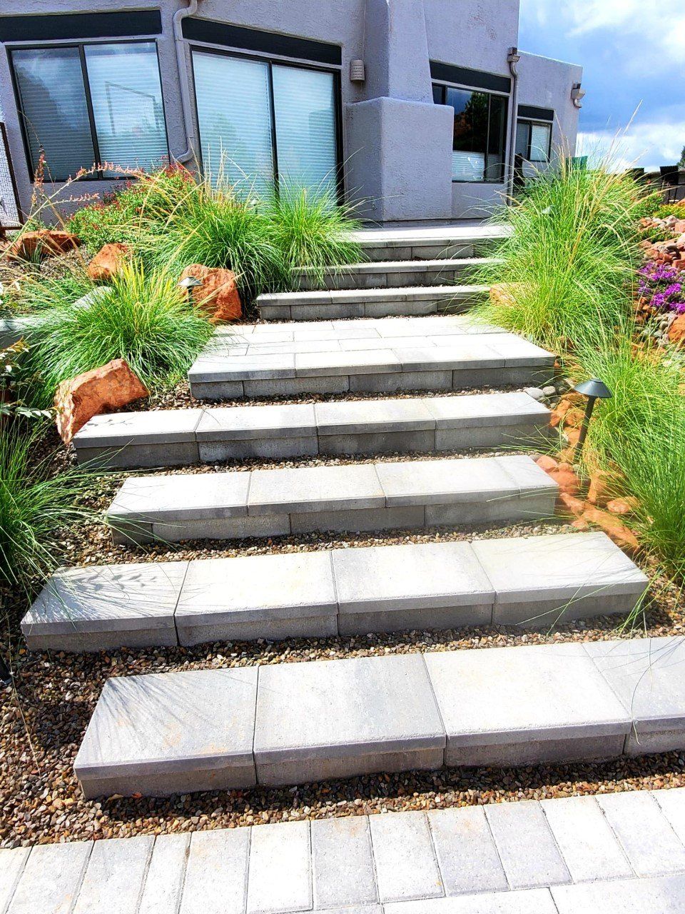 A set of stairs leading up to a house