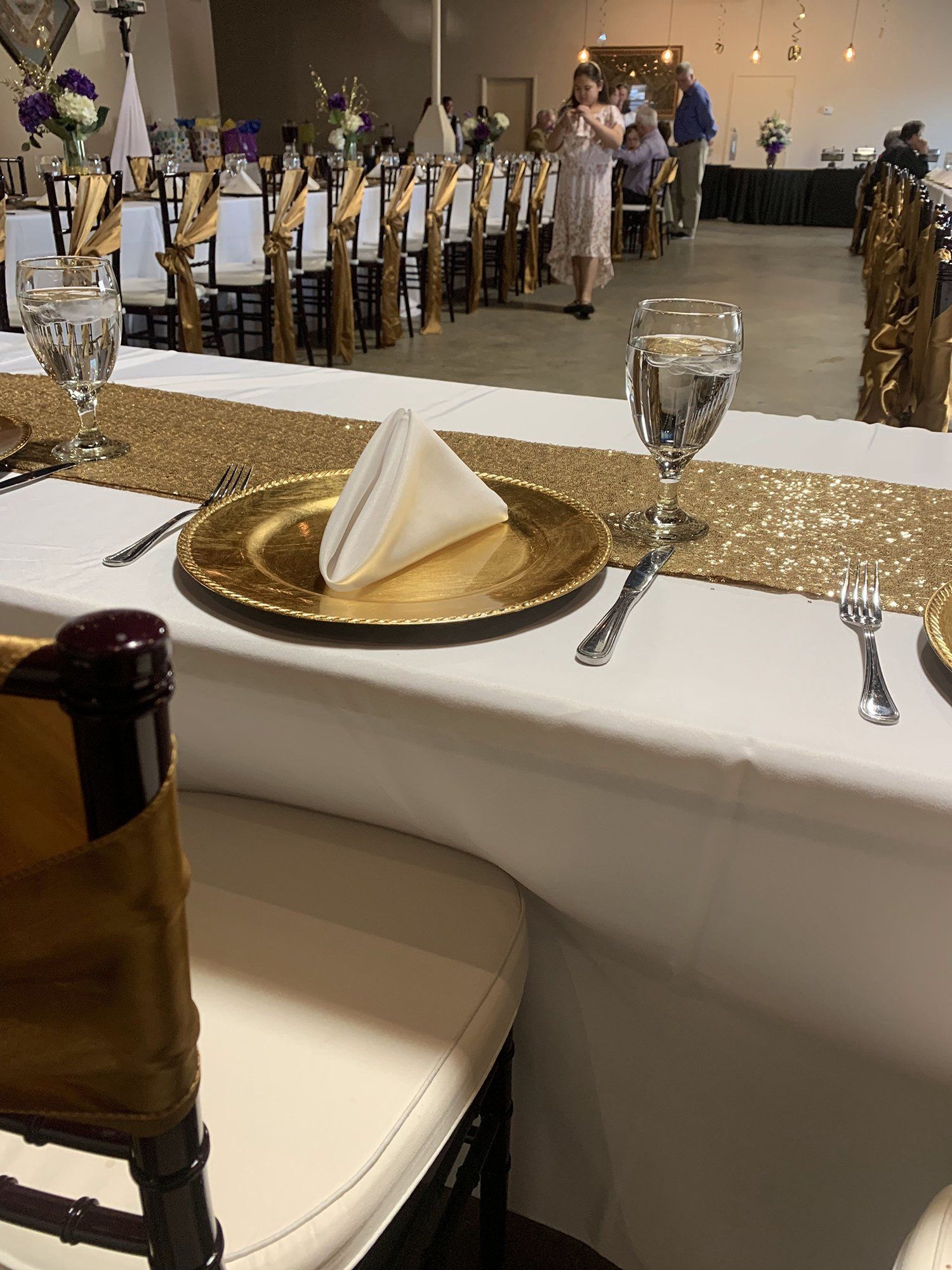 place setting on table with gold decor