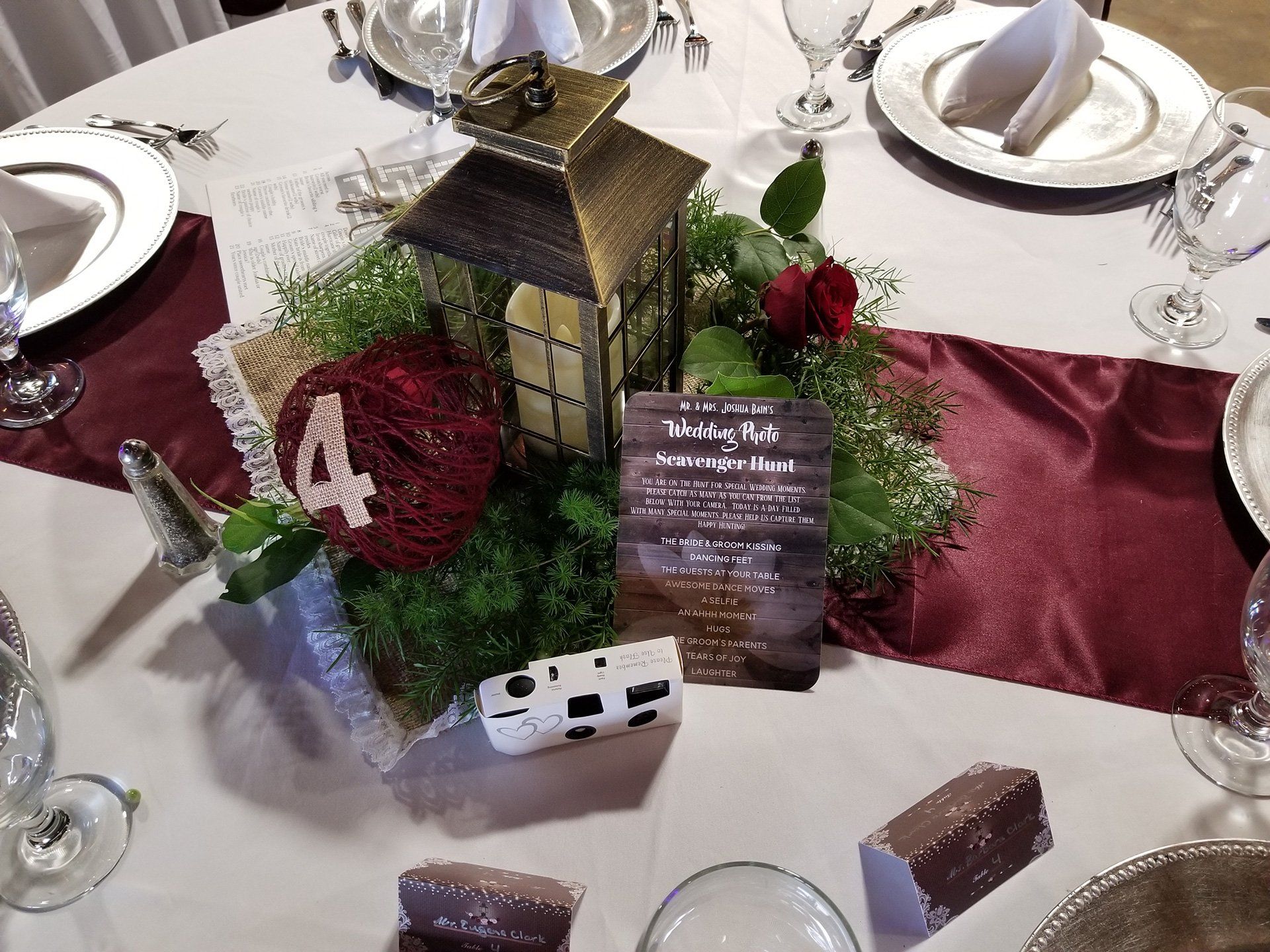 centerpiece with greens and lantern