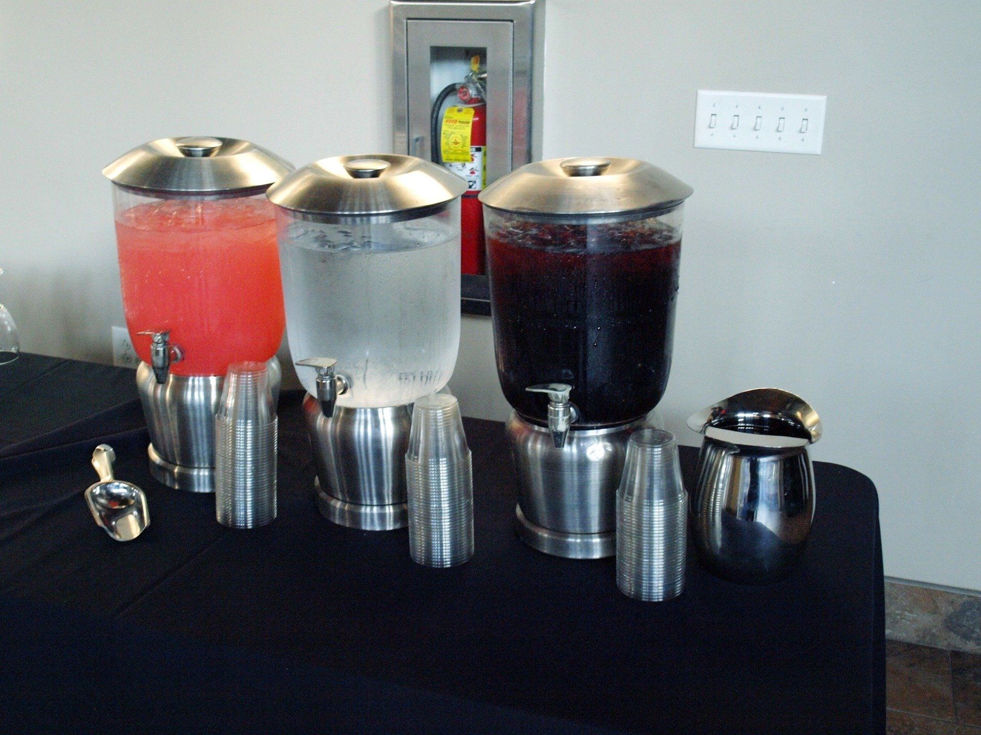 3 beverage jars set up on table