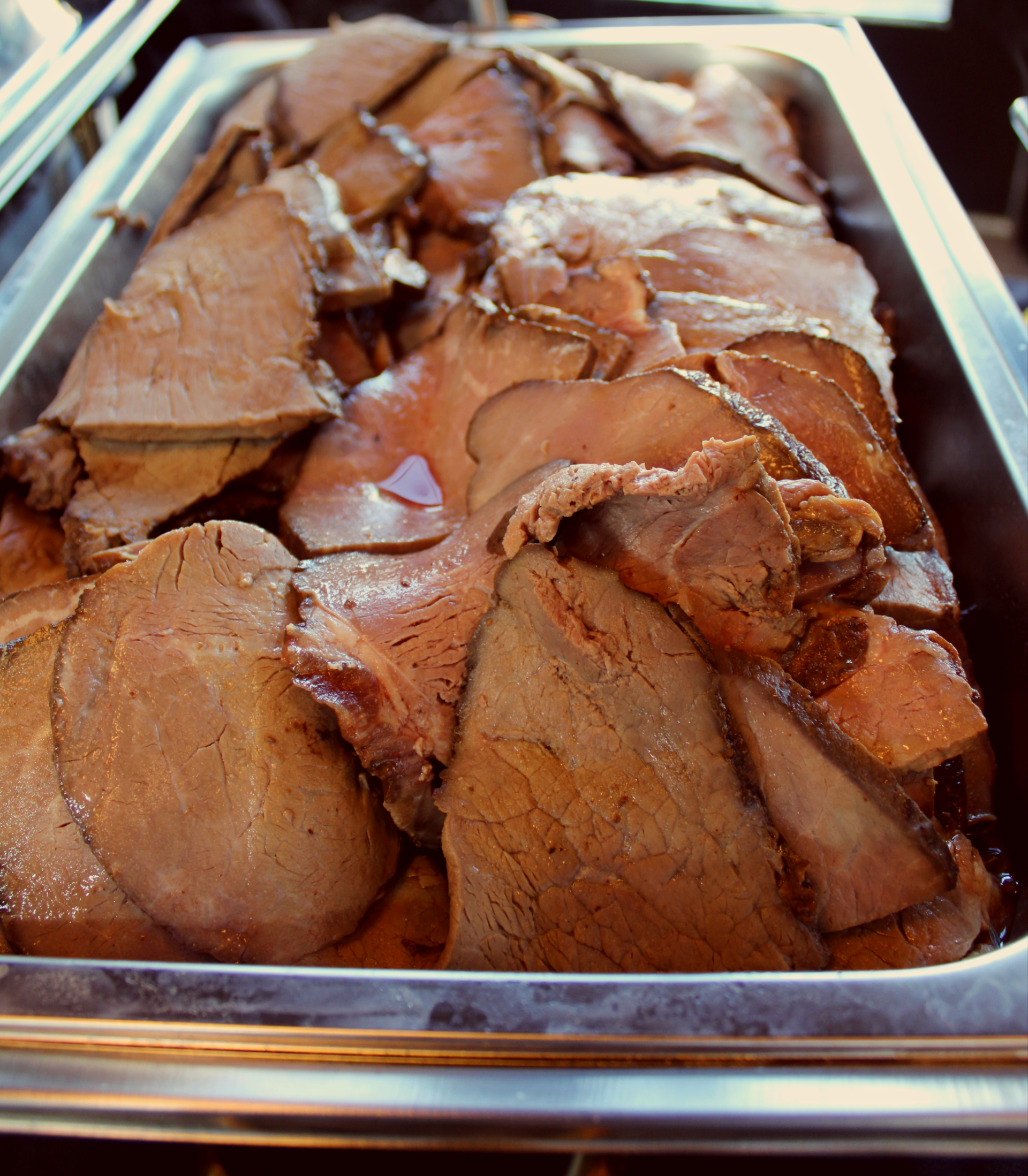 buffet pan filled with roast beef