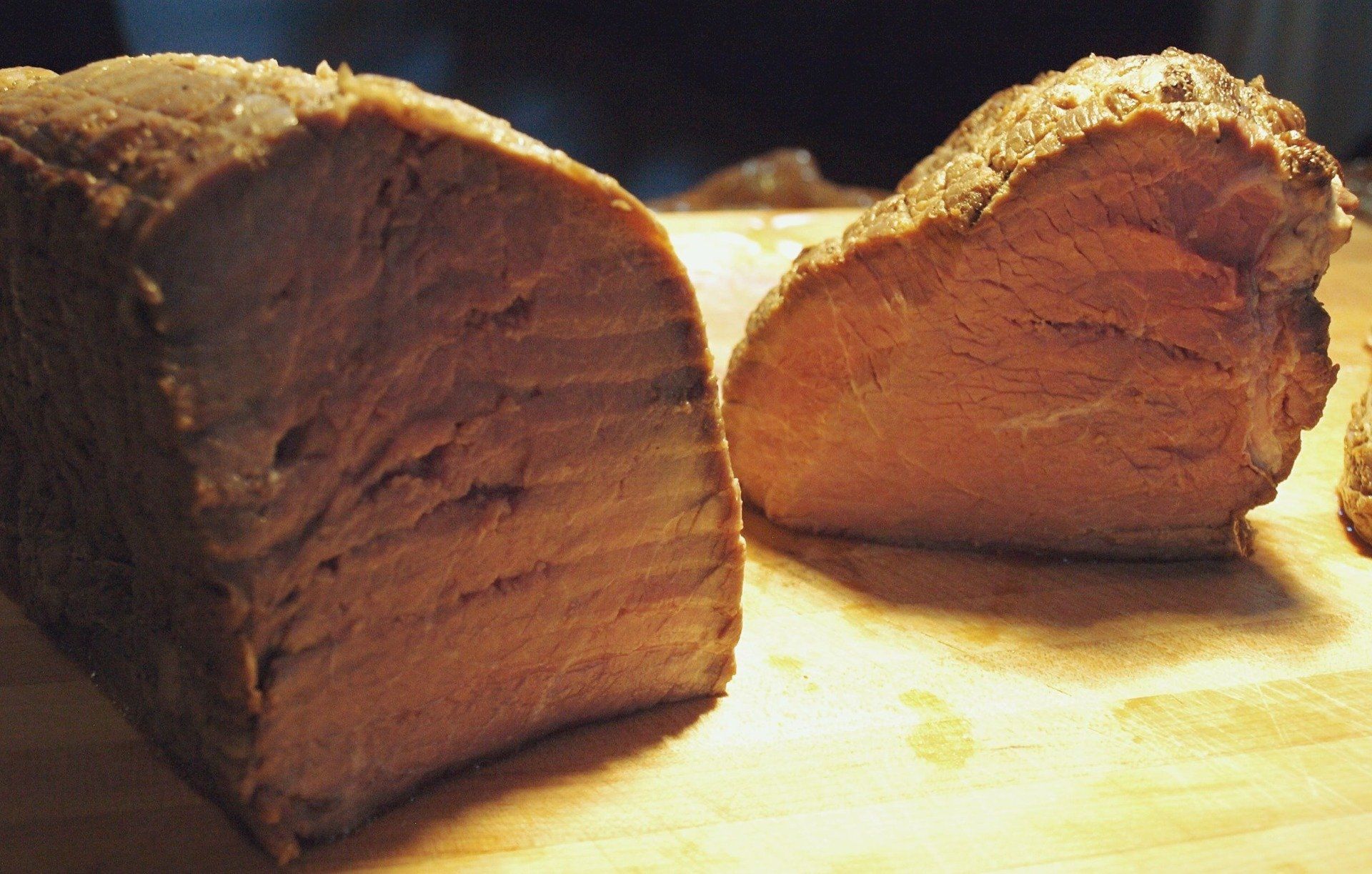 2 roasts on a carving board