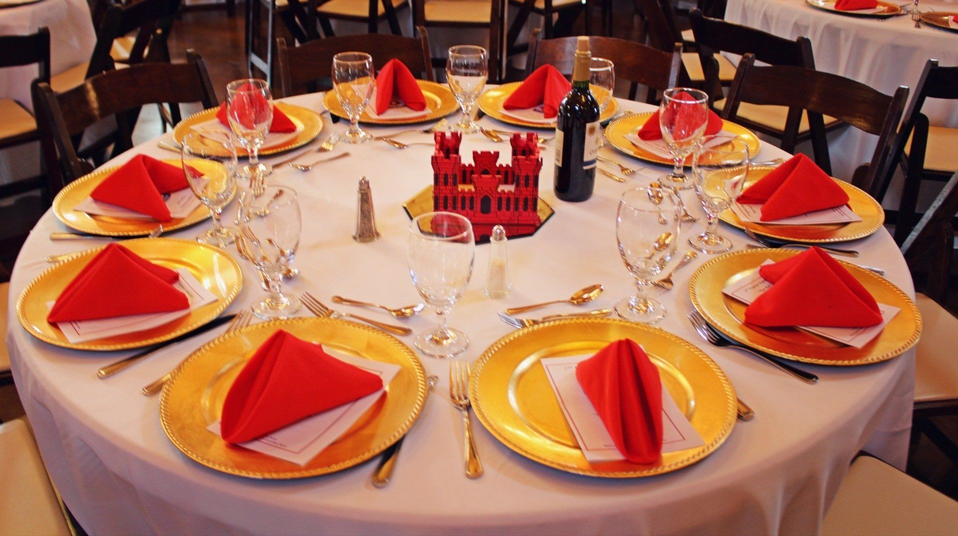 round table with red and gold decore at Military Balls venue