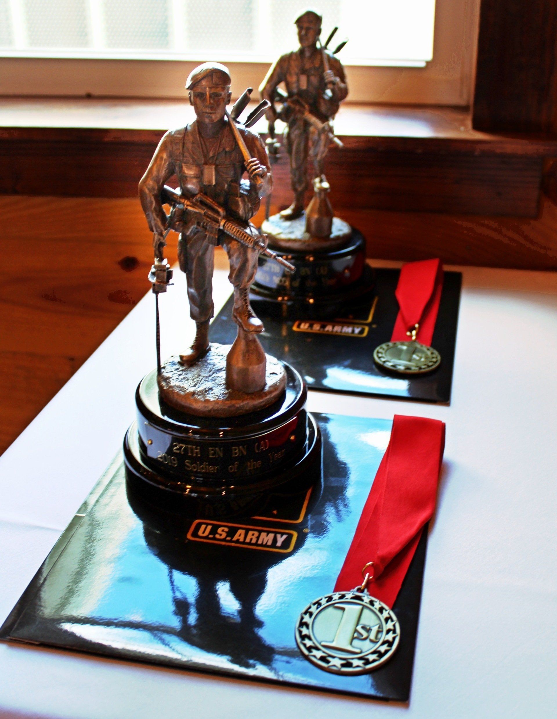 awards displayed for a US Army event