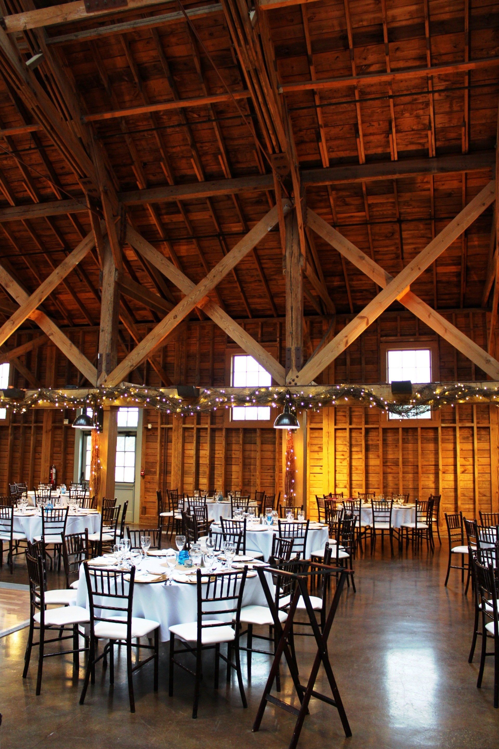 Fair Barn venue set up showing wooden beams