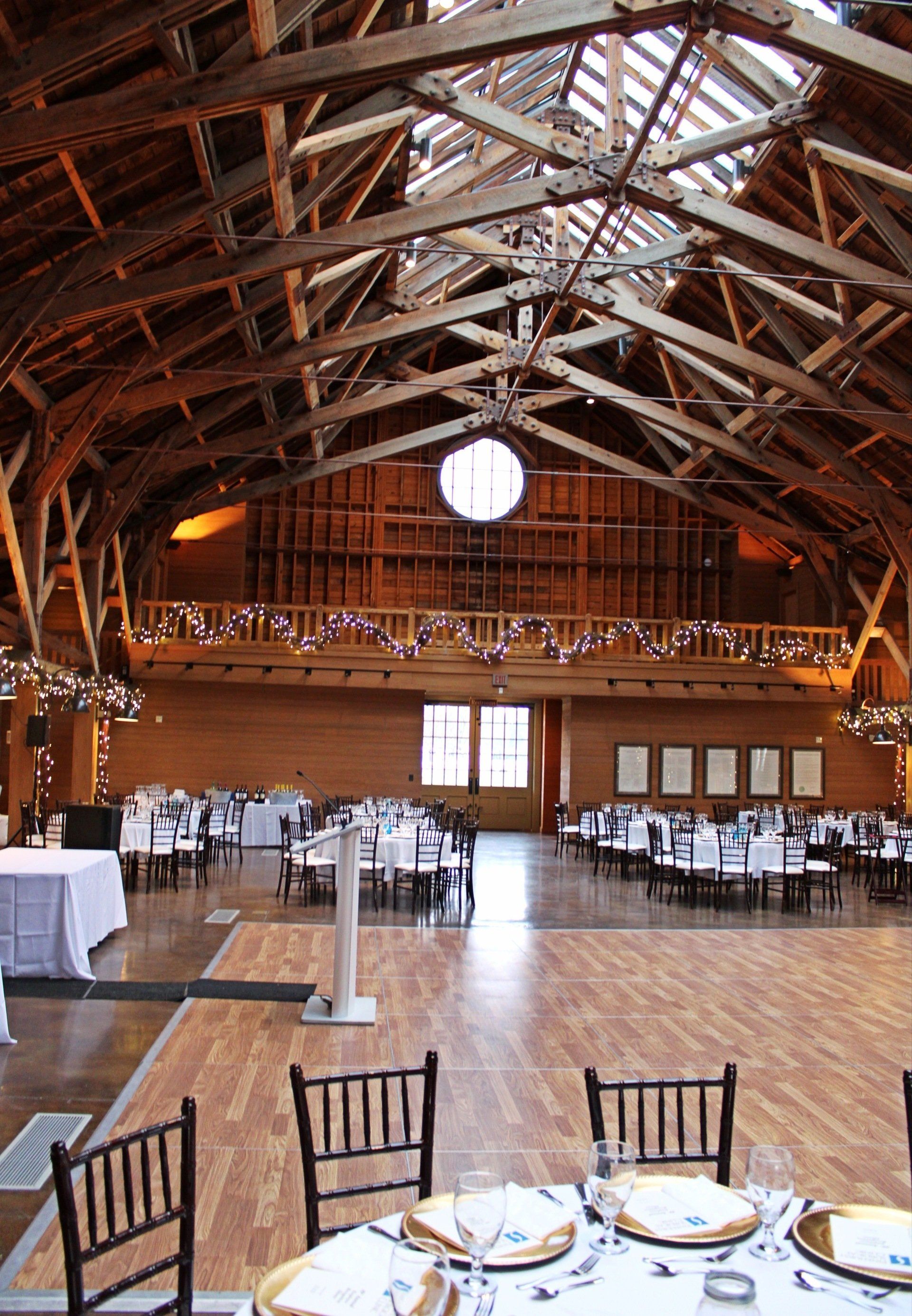 wide angle of Fair Barn venue set up ready for event