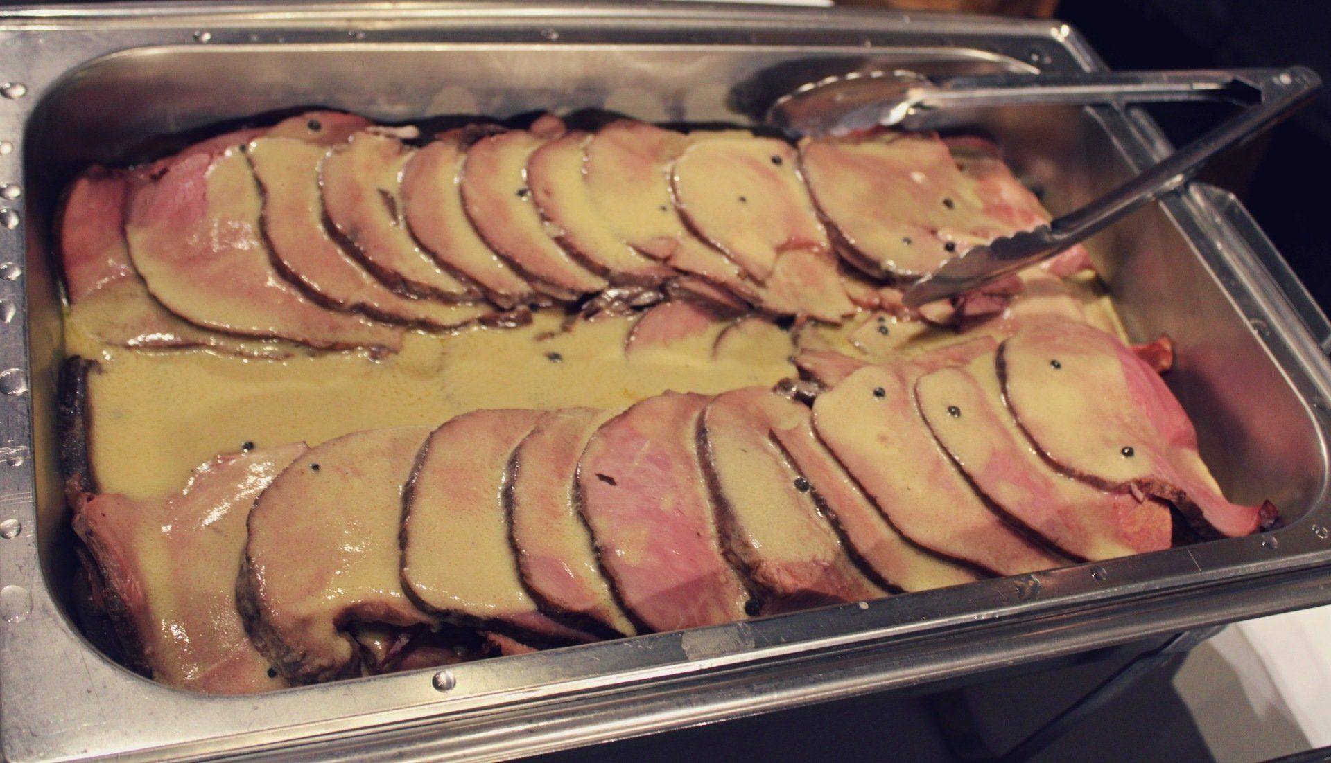 buffet pan filled sliced ham