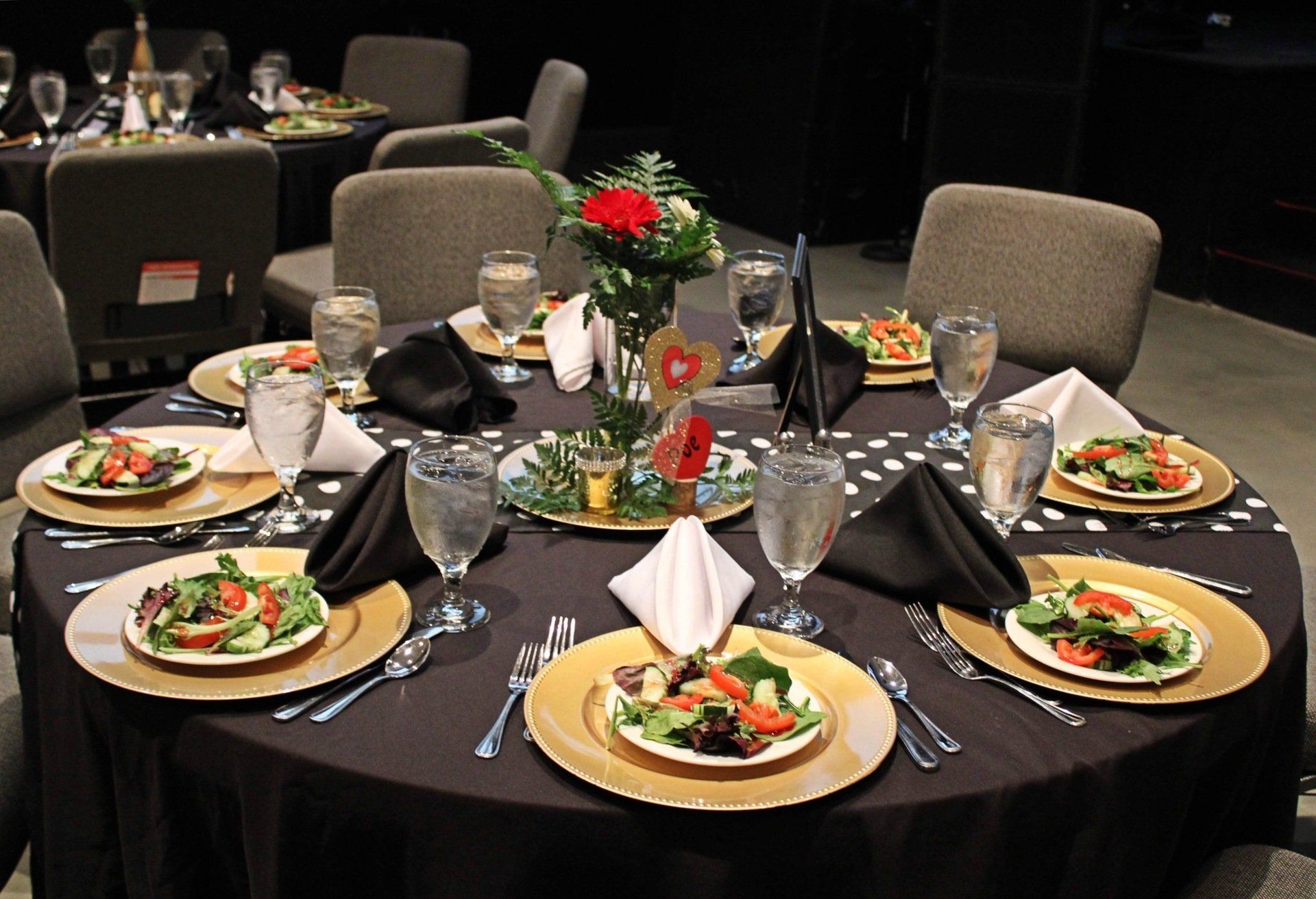 table setting with plated salads at Manna Church venue