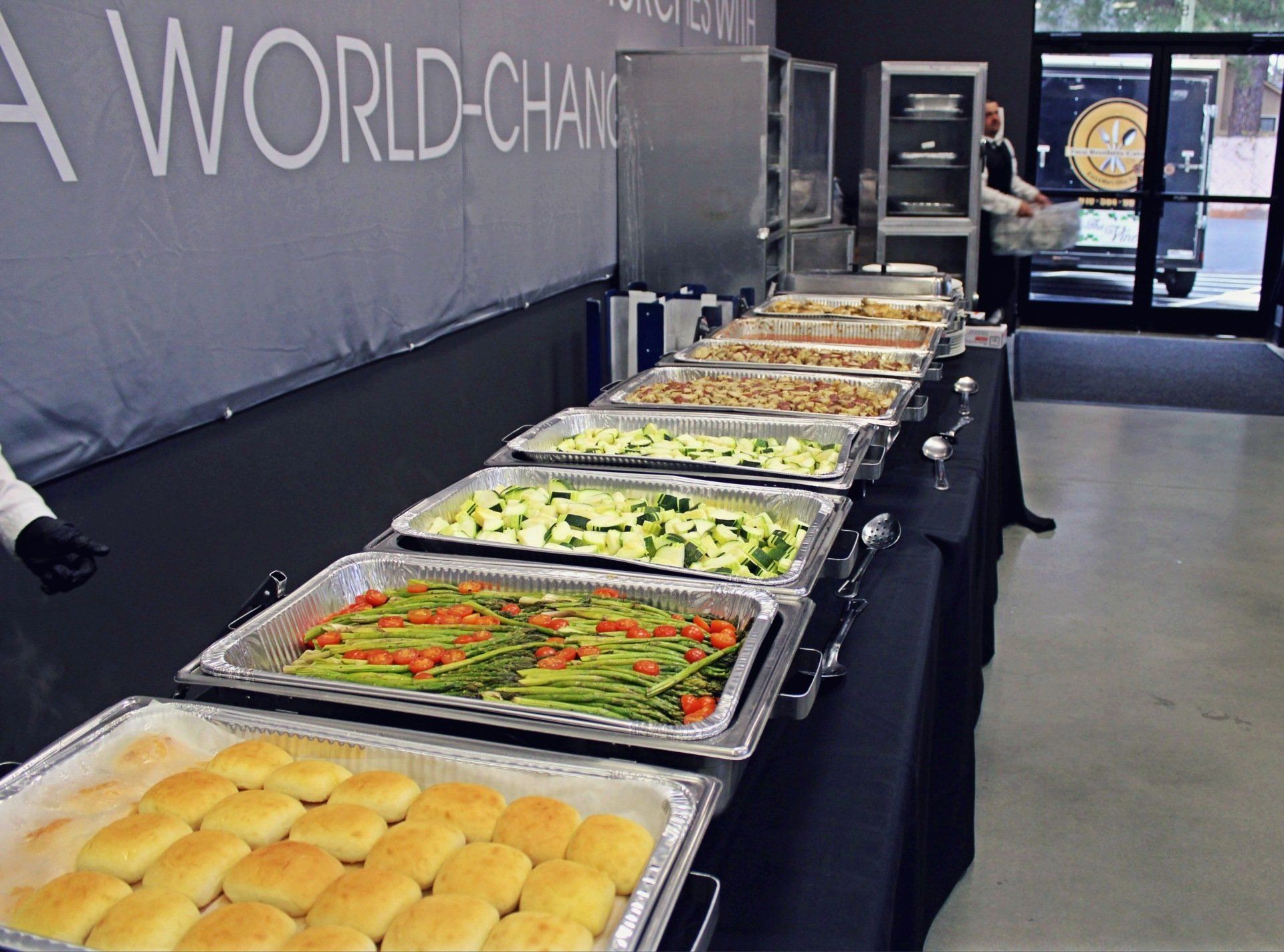 buffet table lined with buffet pans at Manna Church venue