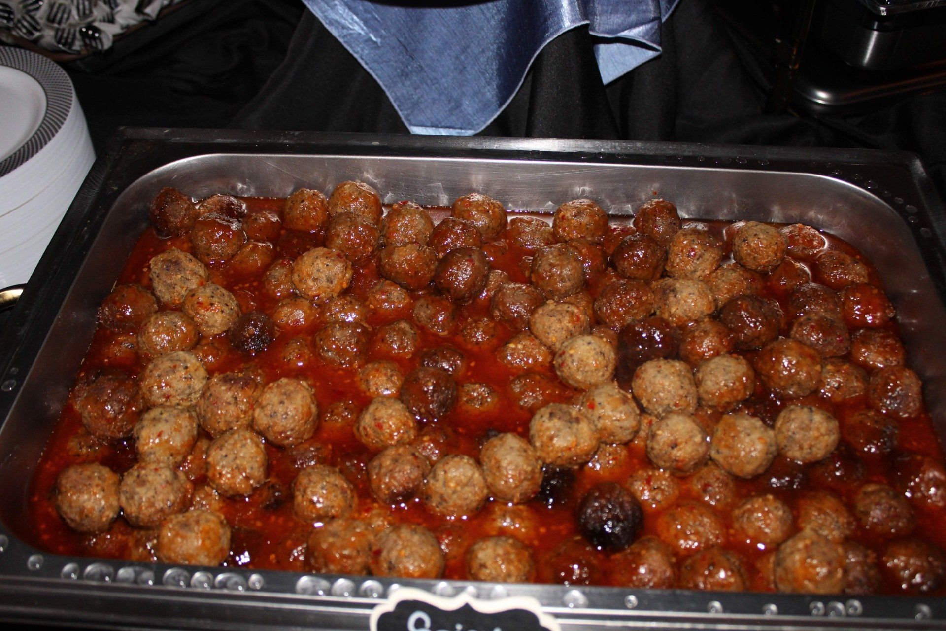 buffet pans filled with meatballs