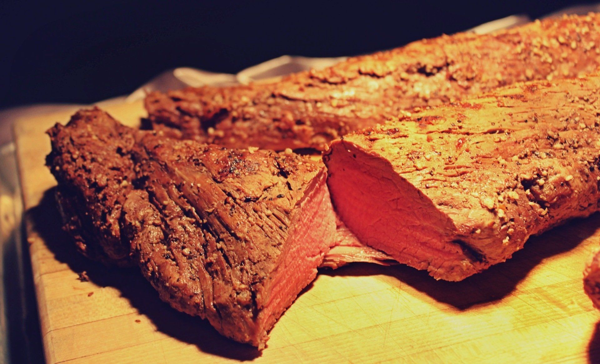 medium rare roast beef on a carving station
