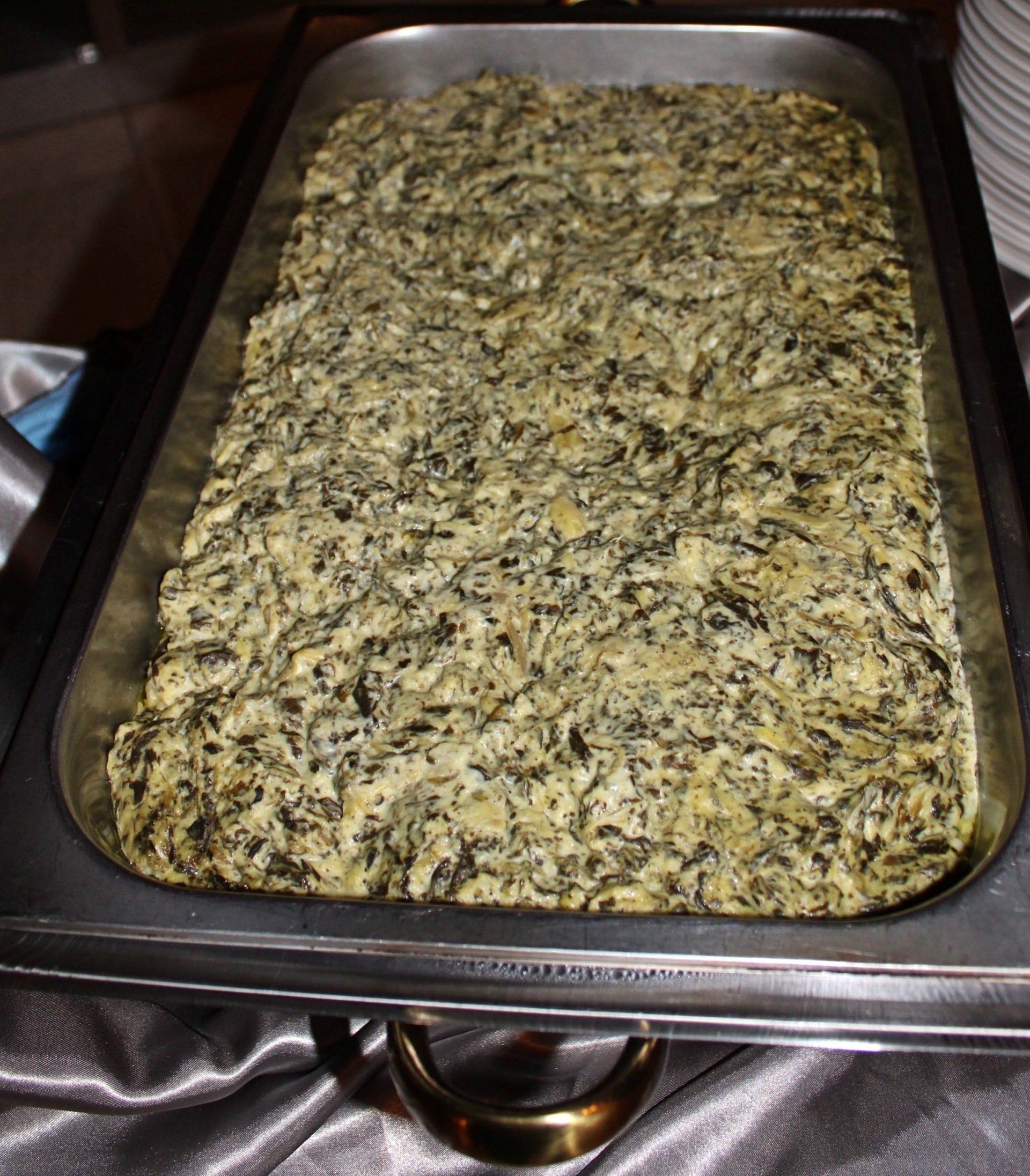 buffet pan filled with spinach dip