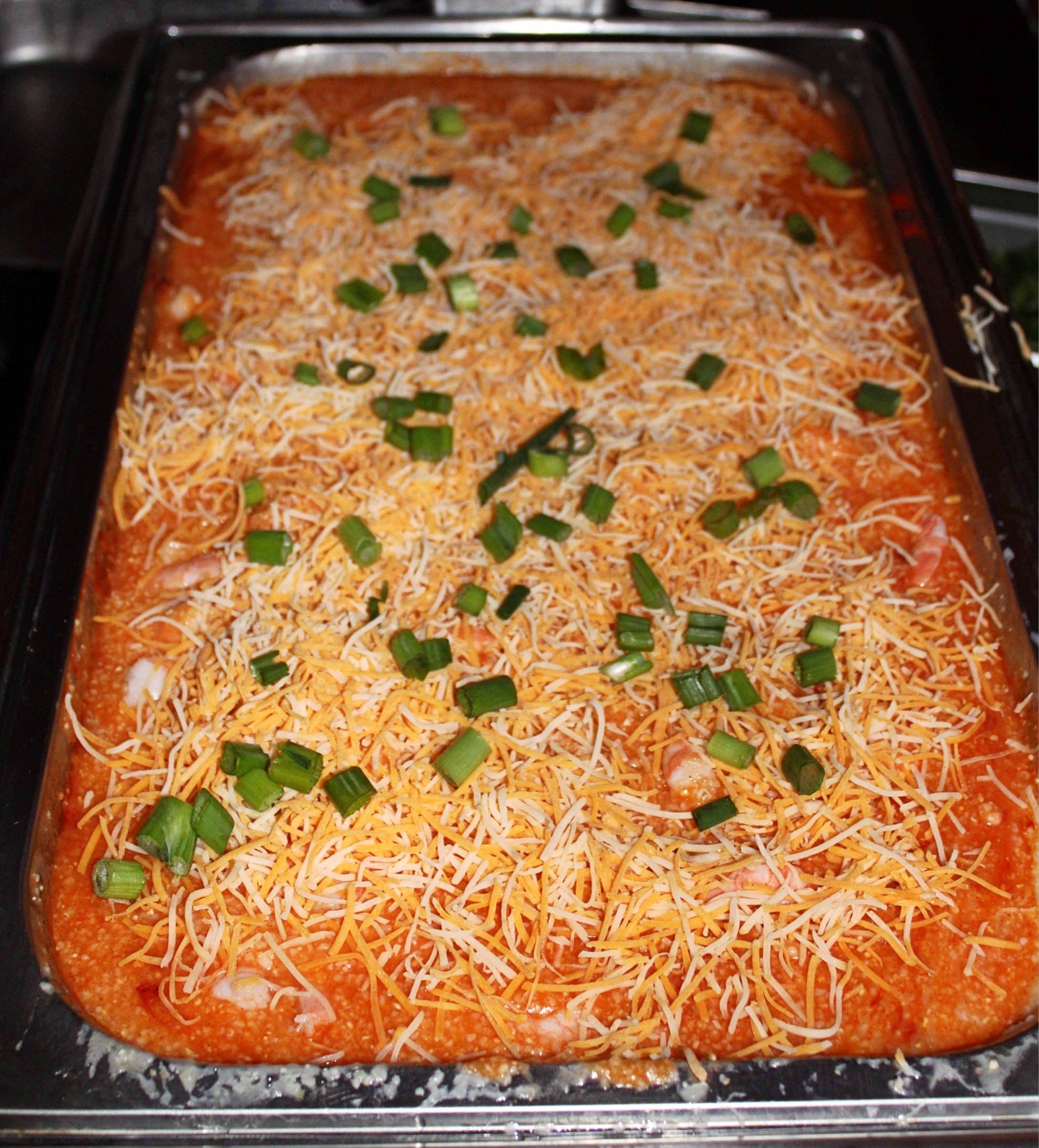 buffet pan filled with shrimp and grits