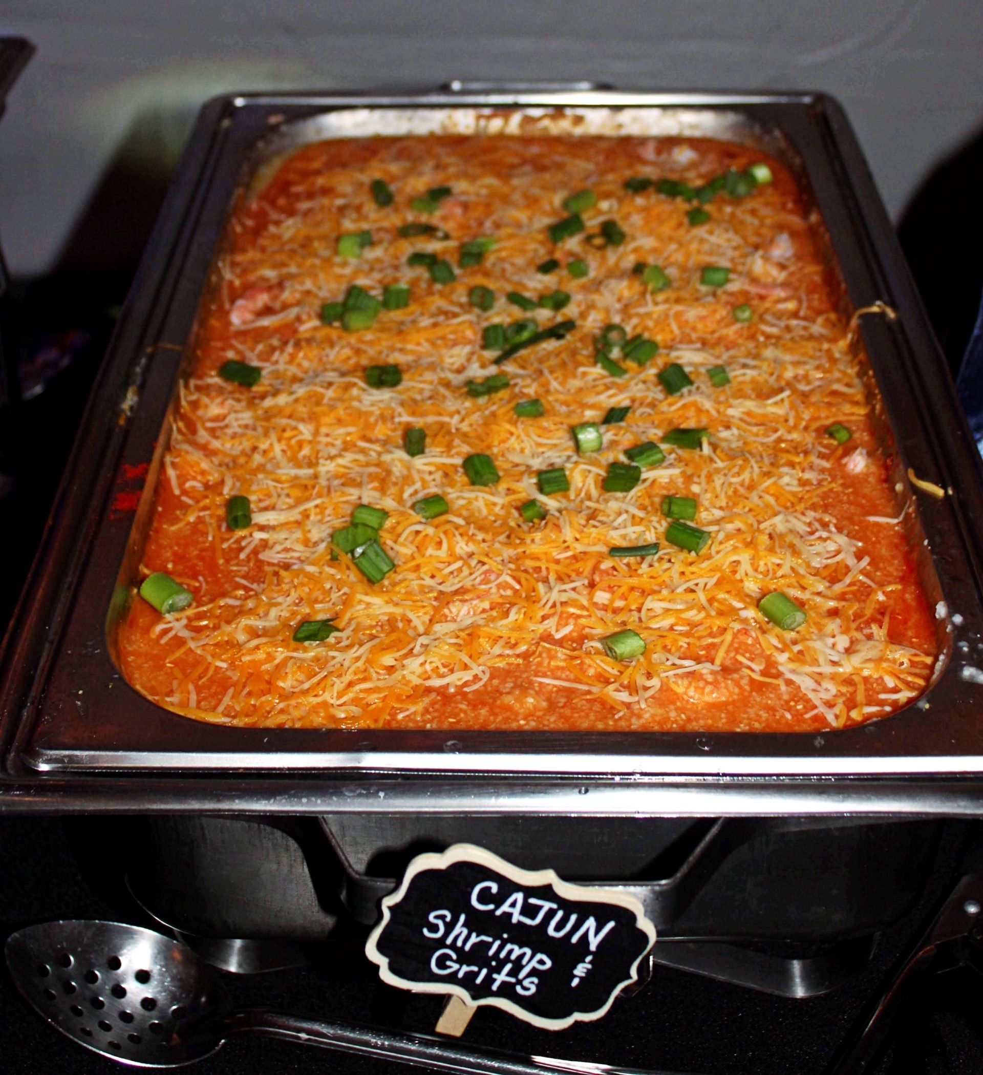 buffet pan filled with shrimp and grits