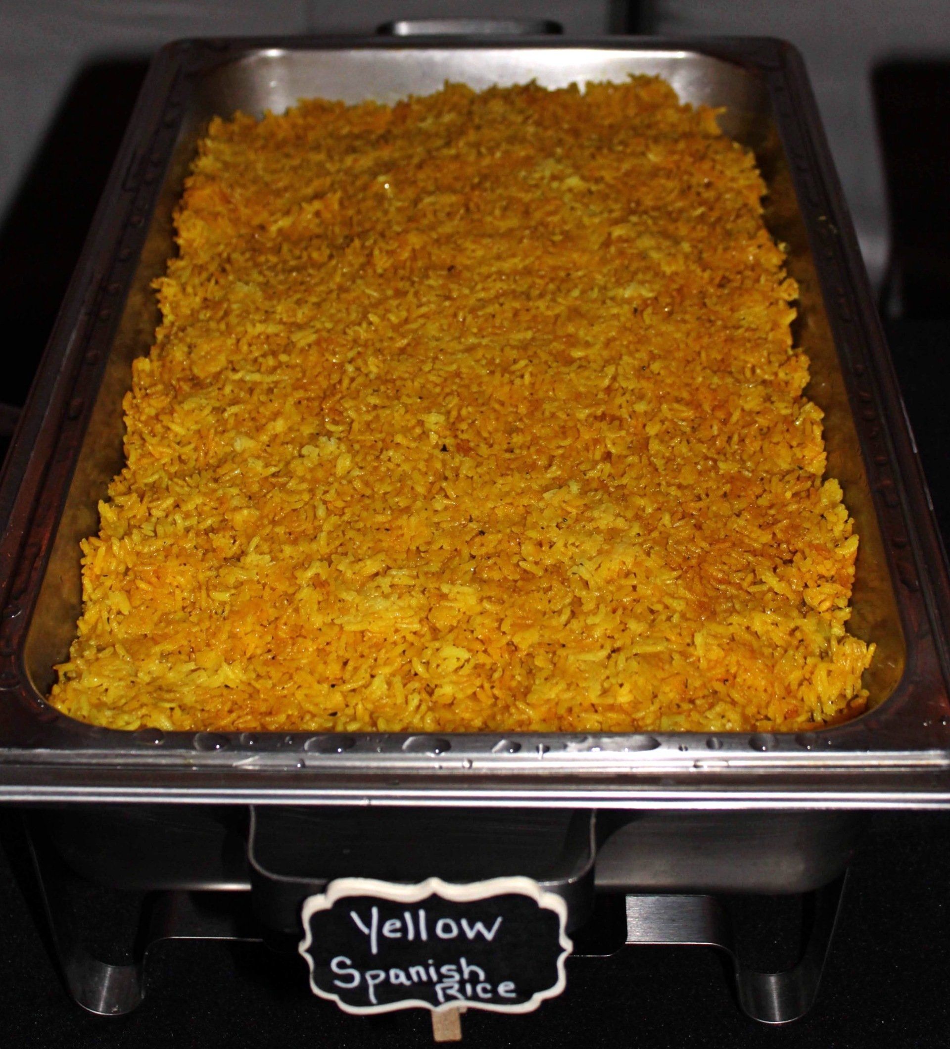 buffet pan filled with yellow spanish rice